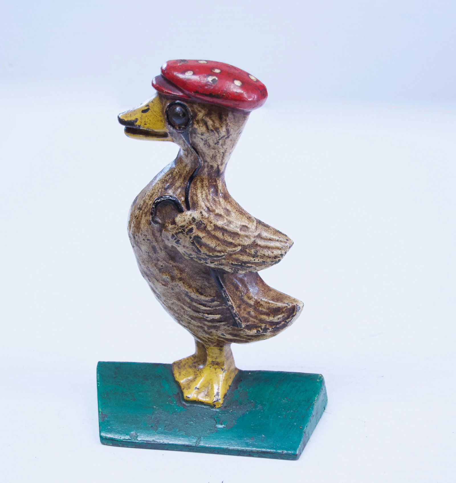 DAPPER DANDY DUCK DOORSTOP: CIRCA 1920'S - DAPPER LOOKING DUCK WITH HAT AND CANE - PAINTED Dimensions: 6 1/4"