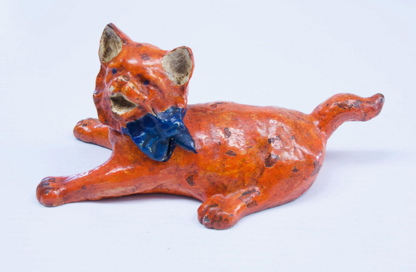 ANTIQUE CAT DOORSTOP: NATIONAL FOUNDRY DOORSTOP - CAT LAYING DOWN "STRETCHING" - PAINTED Dimensions: 9"