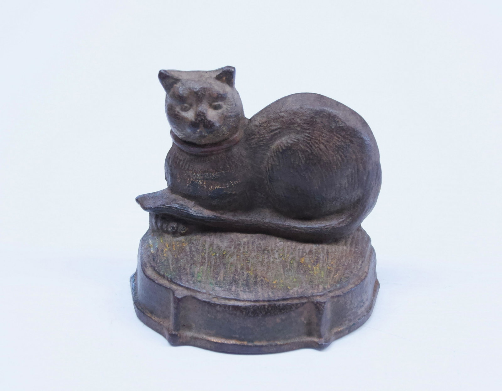 19TH CENTURY CAT DOORSTOP: CAST IRON WEDGE STYLE DOOR STOP - IN ORIGINAL PAINT Dimensions: 4" X 4