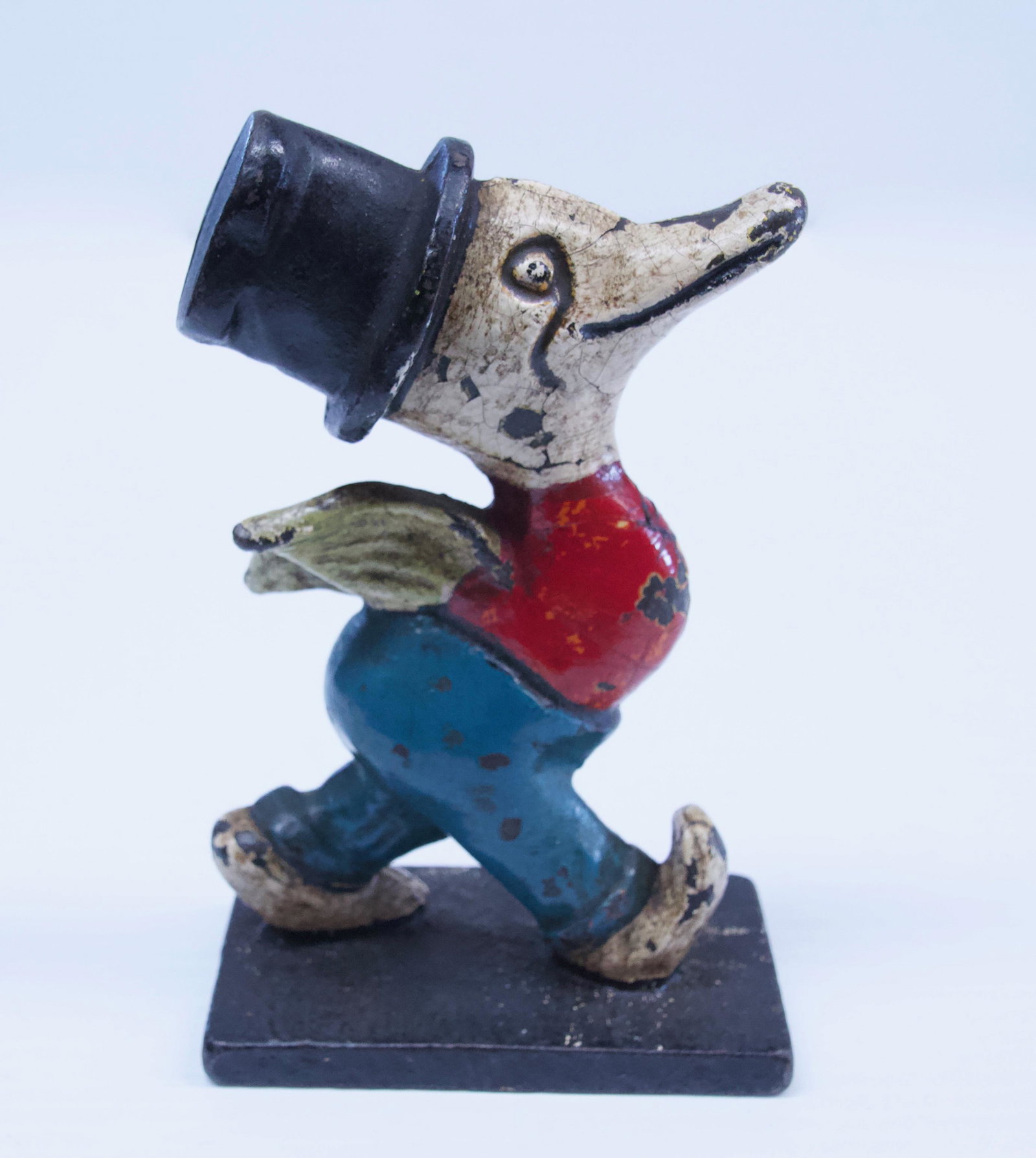 CAST IRON DUCK DOORSTOP: PAINTED WITH TOP HAT Dimensions: 6 3/4" H