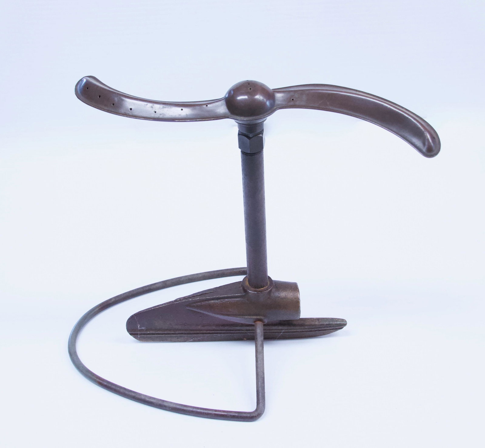 ART DECO LAWN SPRINKLER: CAST IRON AND COPPER. PAINTED BASE Dimensions: 10 1/4" X 9 3/4"
