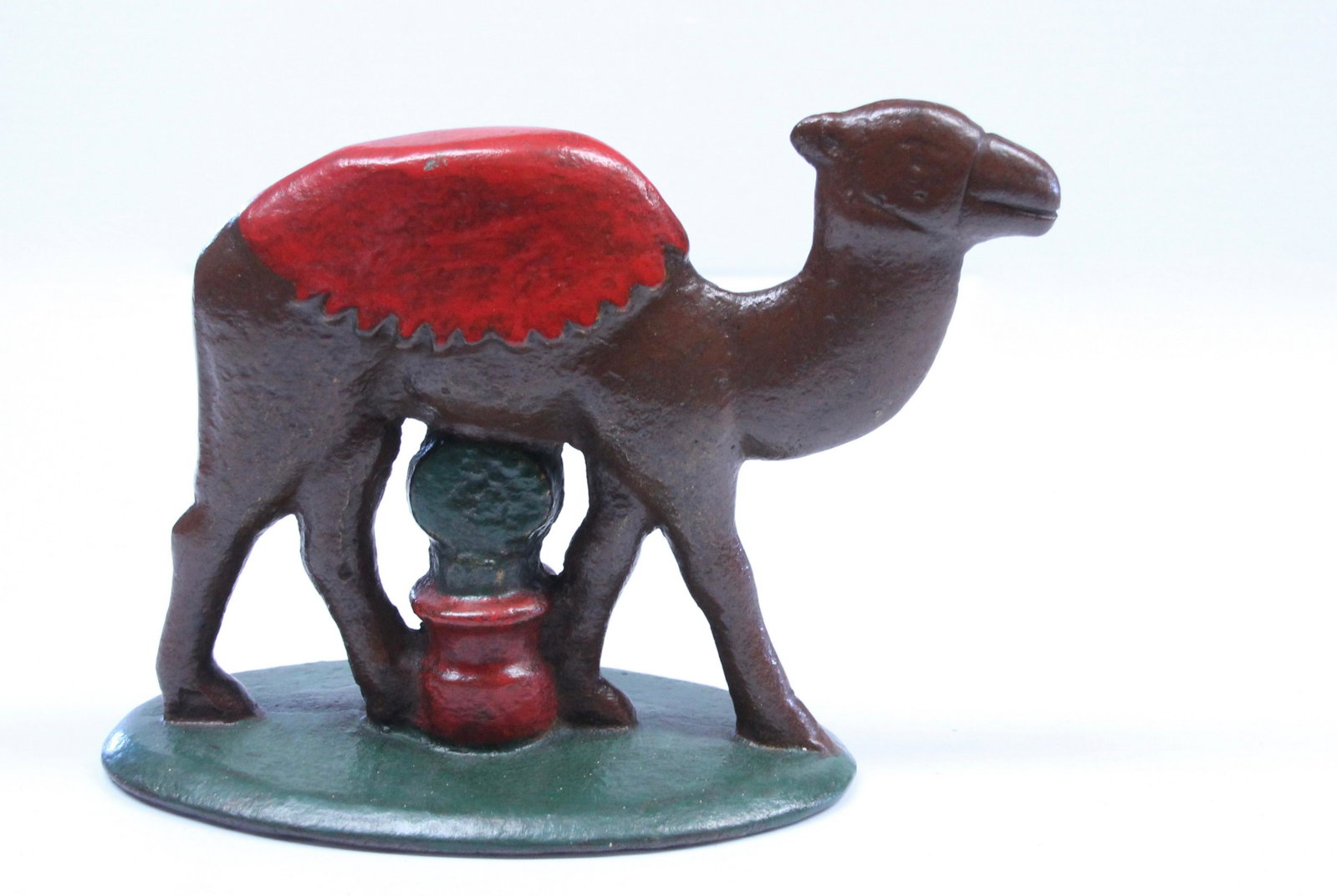 CAST IRON CAMEL DOORSTOP: OLD REPAINT Dimensions: 5 1/2" X 7"