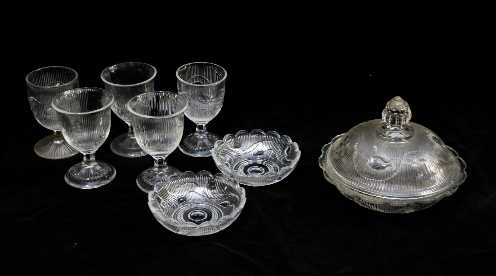 AMERICAN PRESSED FLINT GLASS: SINGLE VINE BELLFLOWER- 5 JUICE OR EGG CUPS- 2 SAUCES- COVERED BUTTER DISH Dimensions: 4" X 2.75"- 4" DIAMETER
