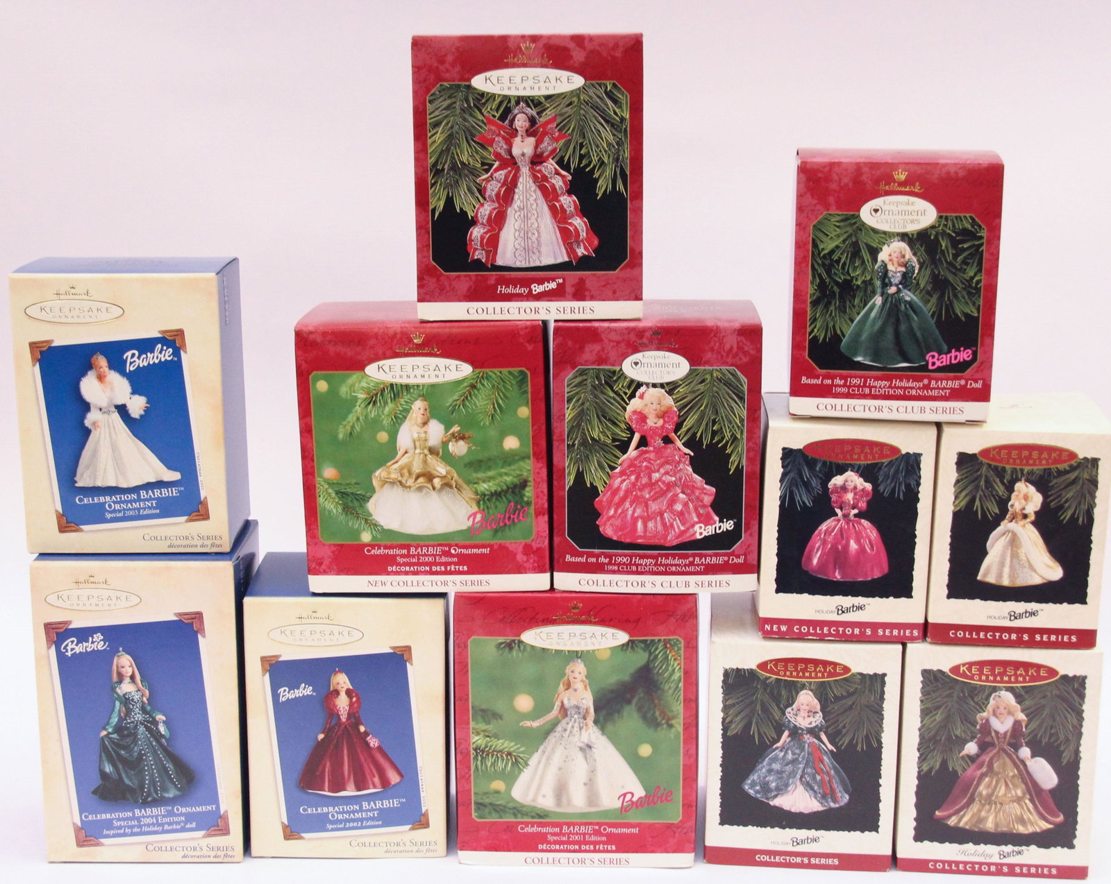 TWELVE HALLMARK BARBIE ORNAMENTS: 1993,94,95,96,97,98,99,2000,01,02,03 AND 2004 Dimensions: 4 1/2"x5 1/2"x 3 1/4"