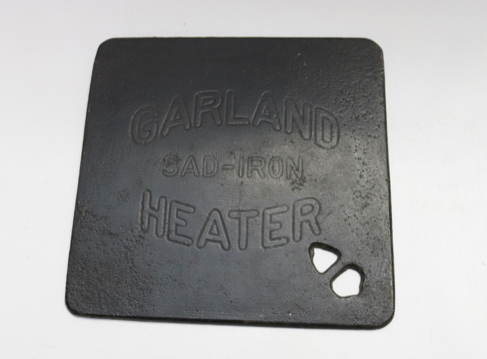 CAST IRON GARLAND SAD-IRON HEATER INSERT (1 of 2)