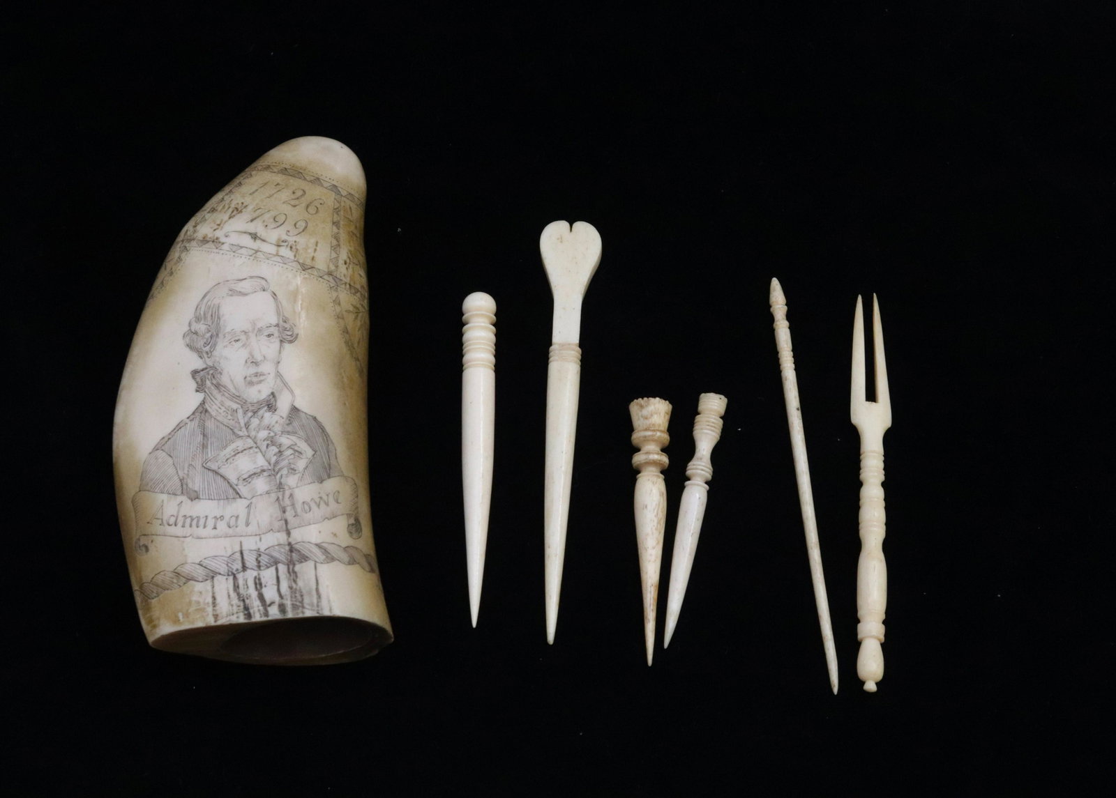 GROUP LOT OF LACE MAKING TOOLS: SIX BONE LACE MAKING TOOLS AND REPLICA SCRIMSHAW WHALE TOOTH TOOLS 3" TO 5". TOOTH 5 1/2"
