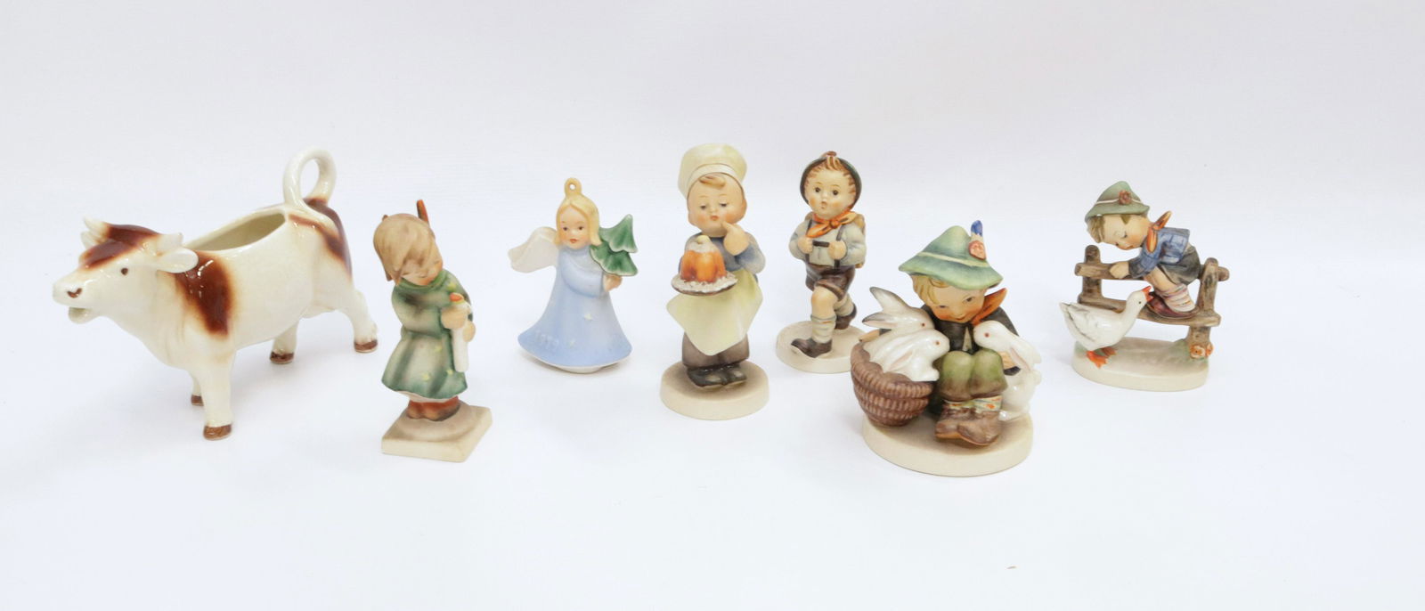 GROUP LOT OF GOEBEL FIGURINES: SEVEN TOTAL. WEST GERMANY 3 3/4" TO 4 1/2" H