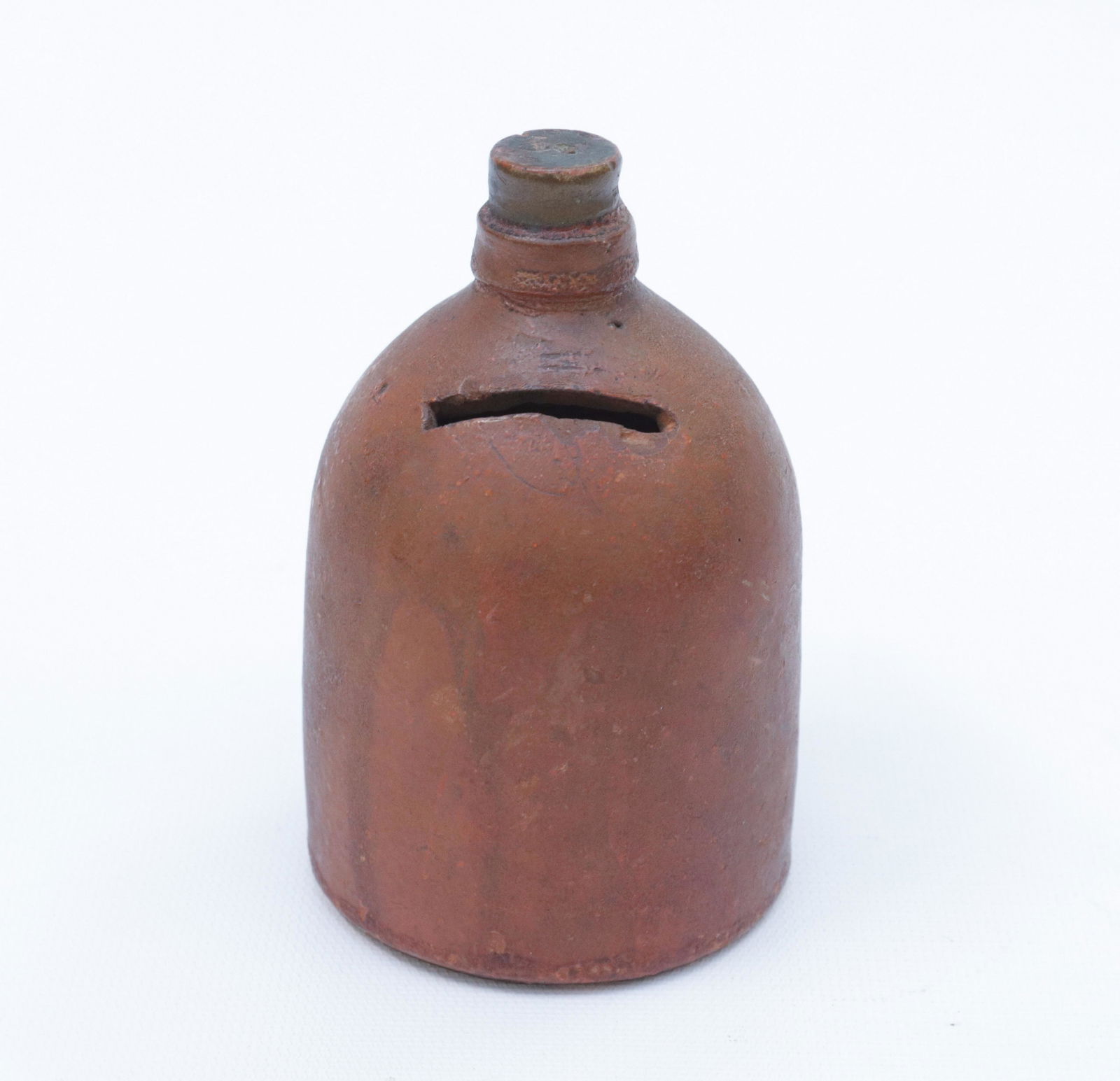 SMALL REDWARE BANK: WITH HANDLE - IN THE FORM OF A JUG 4 1/2" H