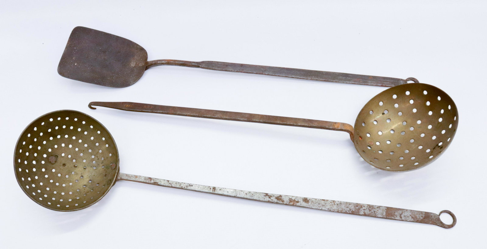 GROUP LOT EARLY UTENSILS: INCLUDING - (2) BRASS STRAINERS AND IRON SPATULA - "JOHN SCHMIDT 1849" BERKS COUNTY, PA ON HANDLE 19" TO 21" L