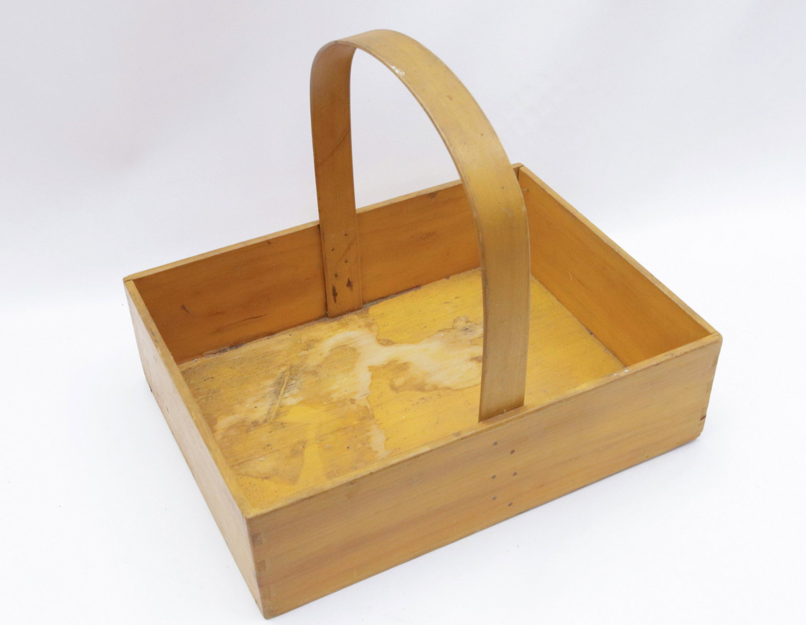 PAINTED WOODEN BERRY CARRIER: DOVETAILED CONSTRUCTION WITH YELLOW WASH - BELIEVED TO BE SHAKER ORIGINS 12" X 13 3/4" X 10 1/2"