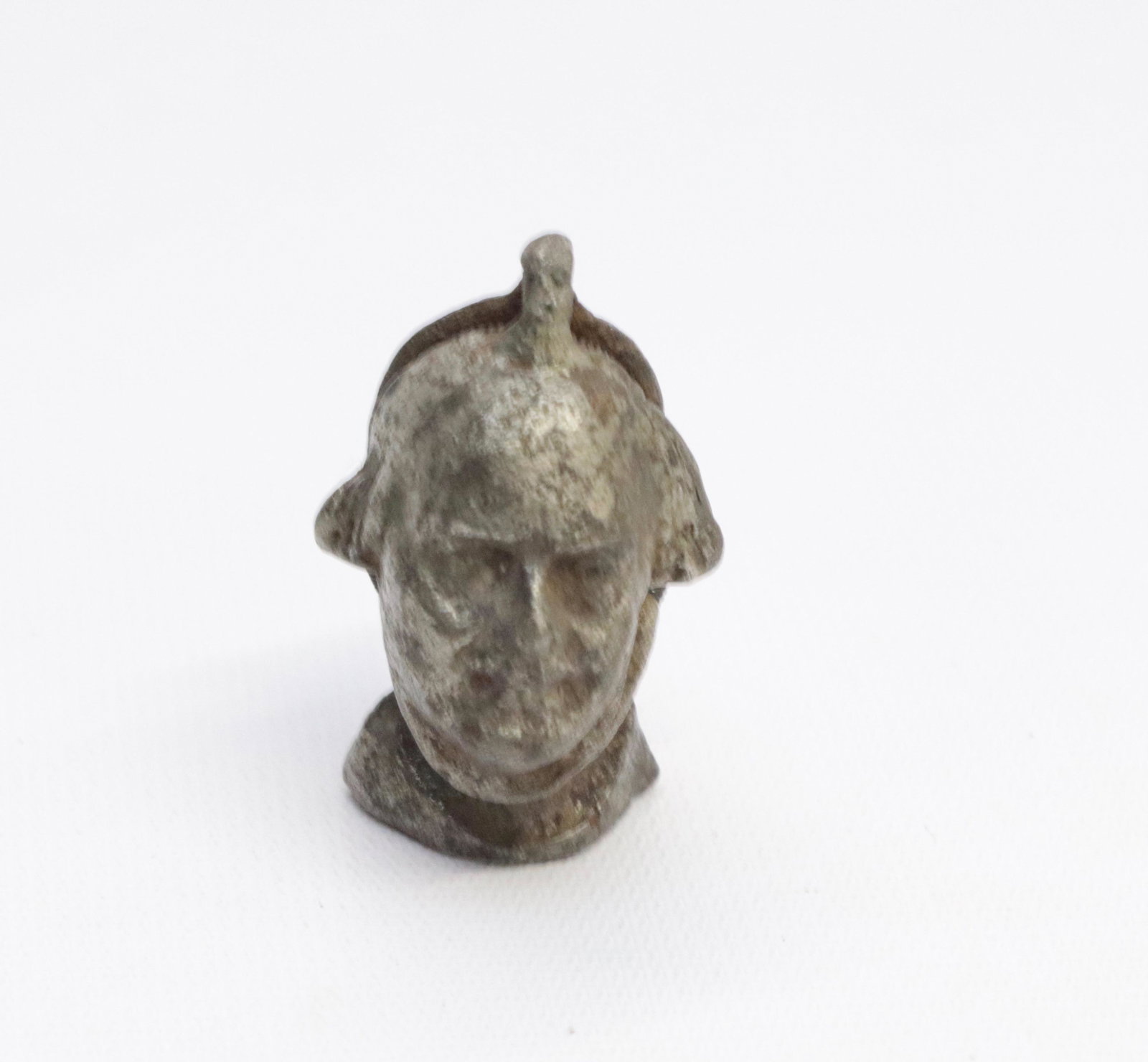 19TH CENTURY CAST IRON CAP BOMB: IN THE FORM OF GEORGE WASHINGTON 1 3/4"