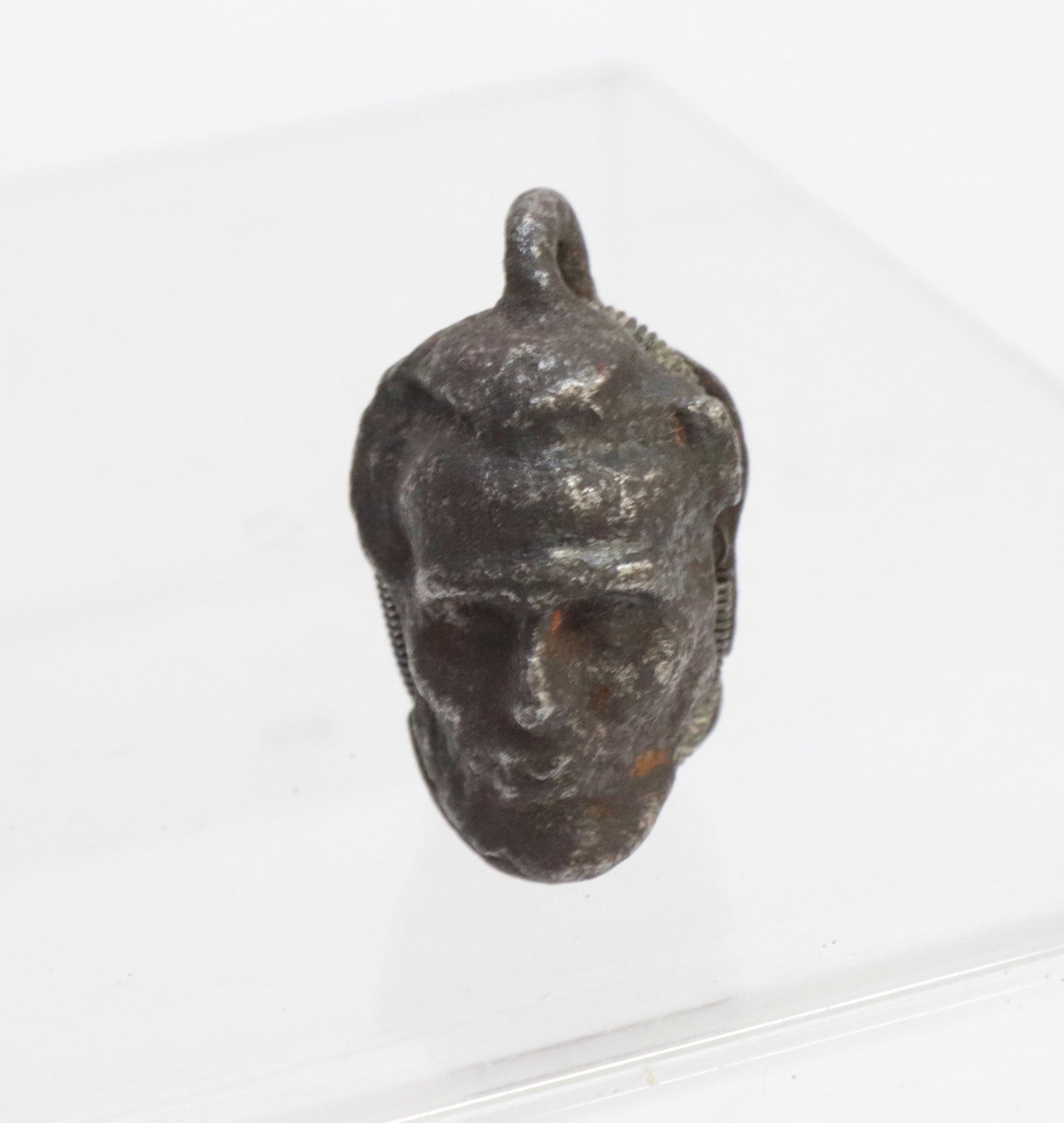 19TH CENTURY CAST IRON CAP BOMB: IN THE FORM OF ABRAHAM LINCOLN 1 1/2"