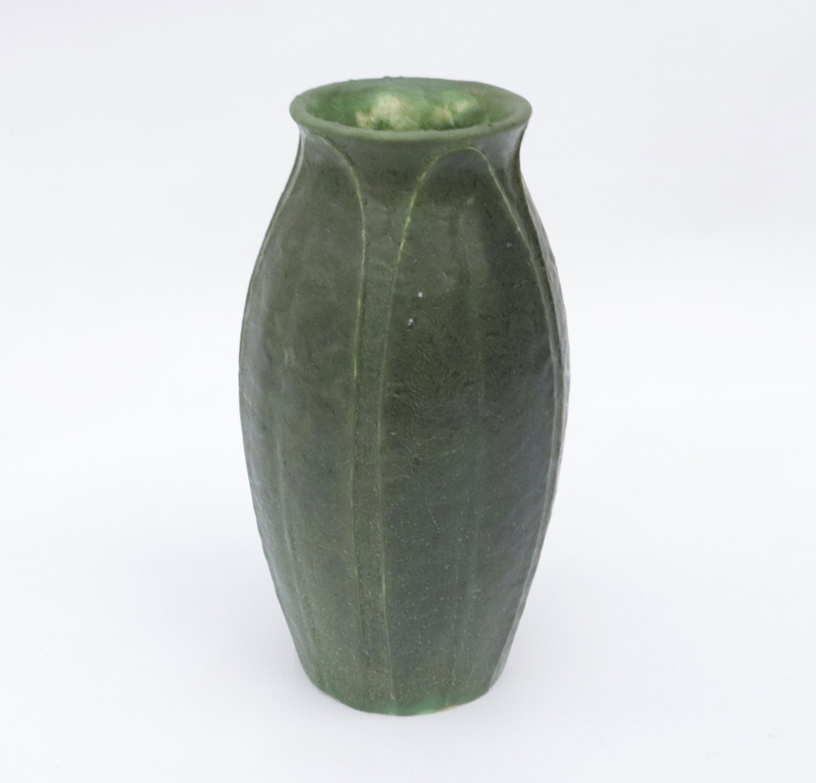 GRUEBY POTTERY VASE: MATTE GREEN WITH CARVED BROAD LEAF VASE - C.H. 136-11 BRUEBY CIRCLE MARK Dimensions: 8" X 4"