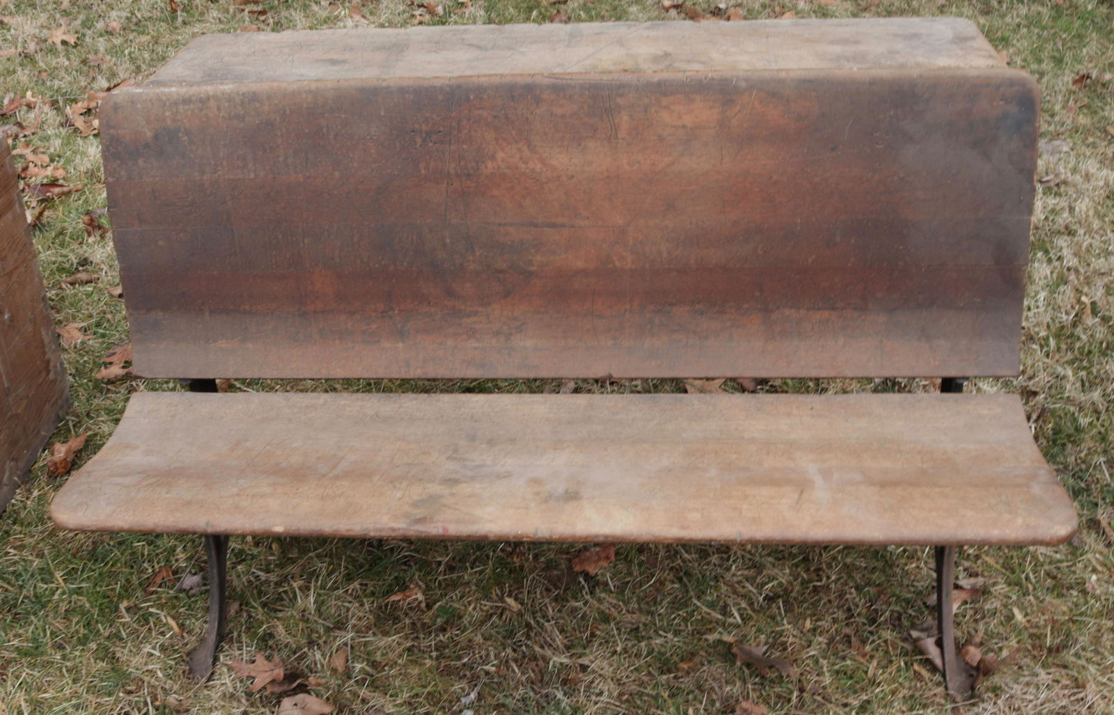 WOODEN DOUBLE SCHOOL DESK: WOODEN SURFACE WITH CAST IRON ENDS Dimensions: 26" X 42" X 32"