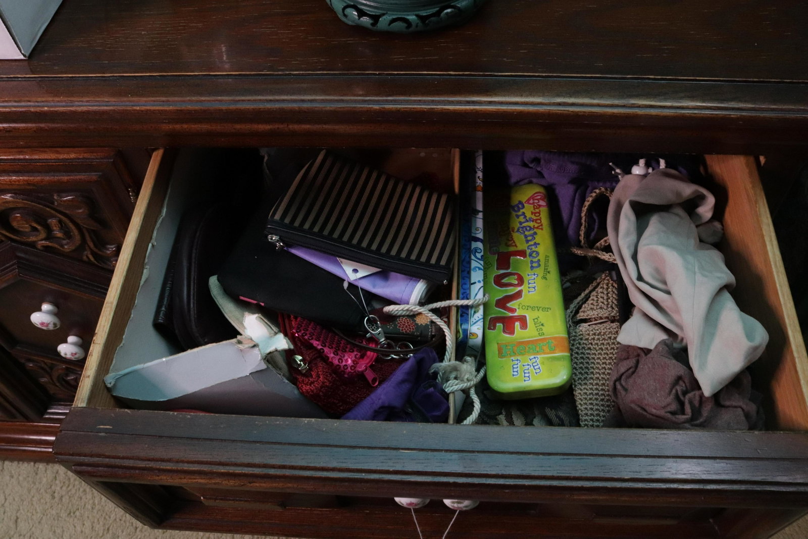 CONTENTS OF LARGE DRESSER: CLOTHING INCLUDING - COTTON AND WOOL SWEATERS - LADIES SIZES - SMALL CHANGES PURSES - SCARVES - AND MORE