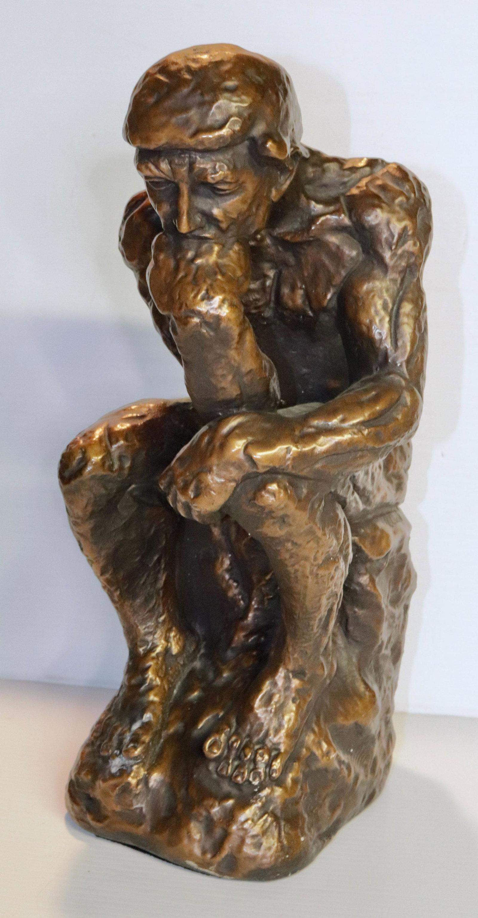 VINTAGE PLASTER SCULPTURE: PAINTED PLASTER - DEPICTS "THE THINKER" SIZE: 16" H