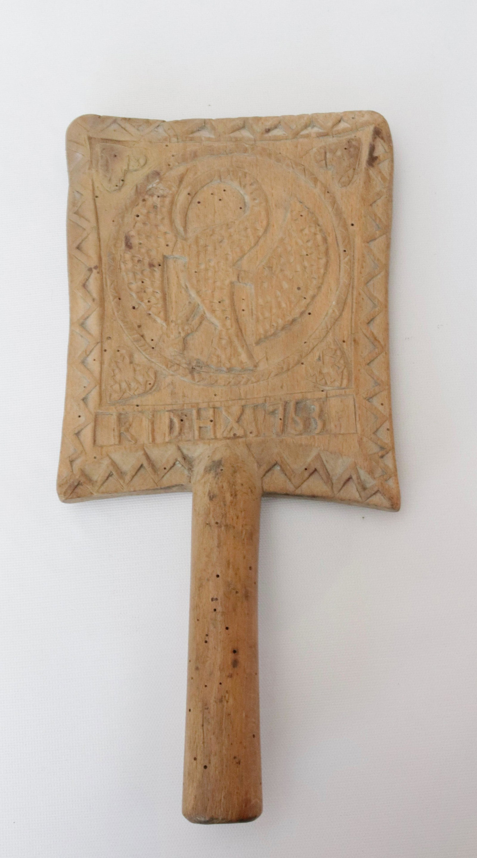SCANDINAVIAN HAND CARVED WASHING BAT: WITH CARVED EAGLE, HEARTS, INITIALS, AND DATED 1763 DIMENSIONS: 13 1/2"