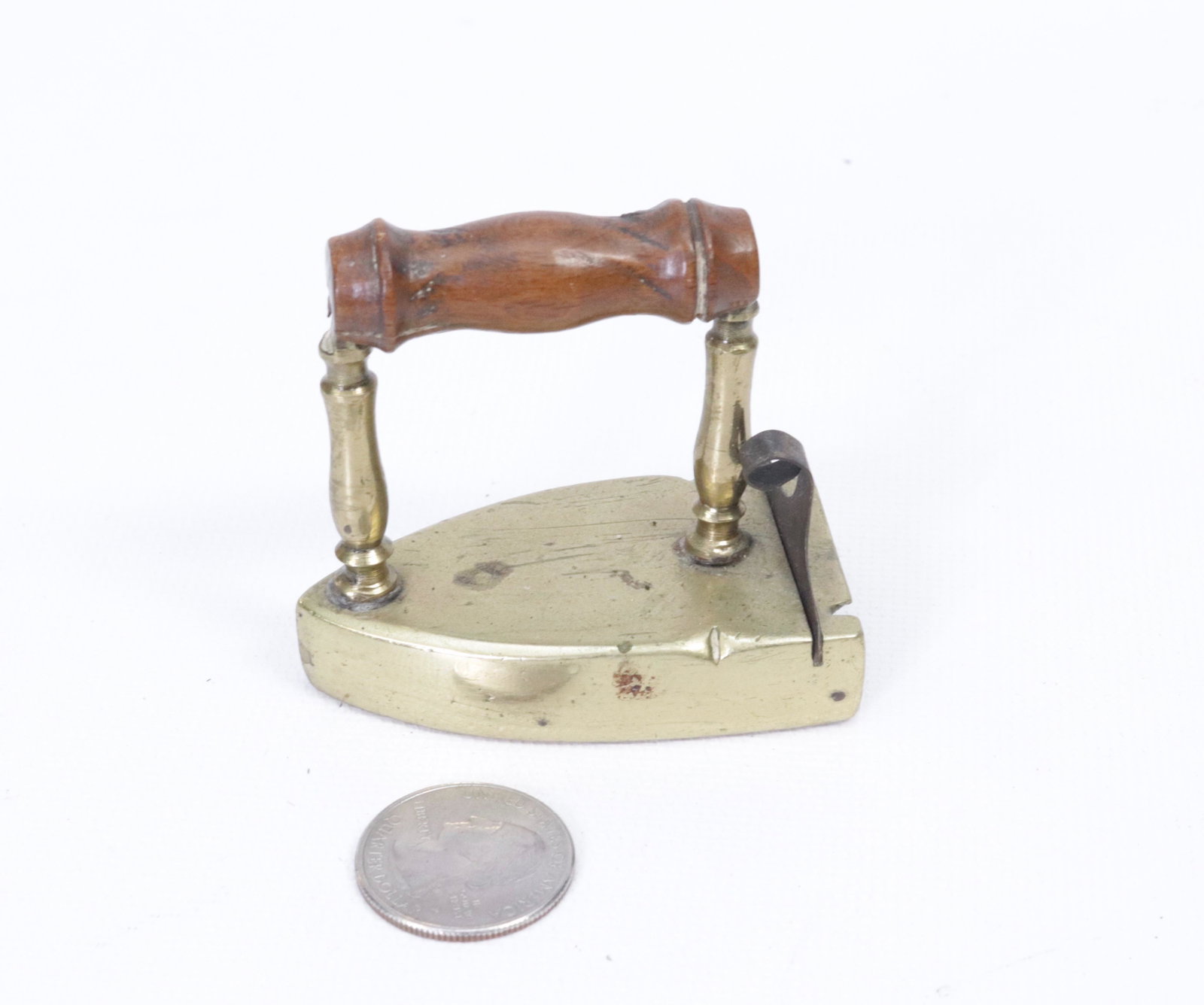 BRASS SLUG IRON: SMALL SIZE IRON WITH LIFT OUT GATE DIMENSIONS: 2 1/4"