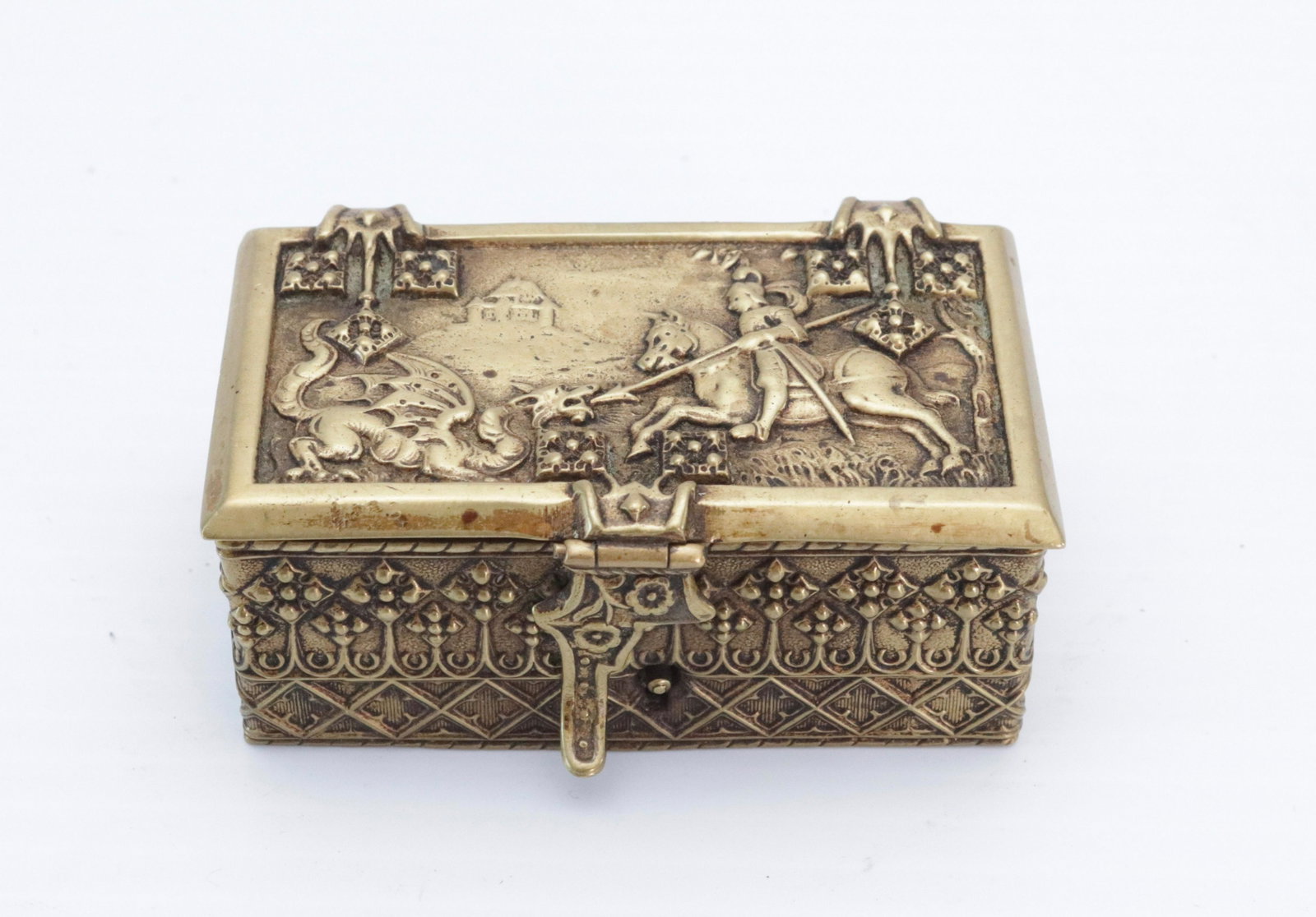 19TH CENTURY BRASS MATCH BOX HOLDER: FRENCH WITH KNIGHT AND DRAGON ON LID - MARKED ON BOTTOM 1 1/8" X 3" X 1 3/4"
