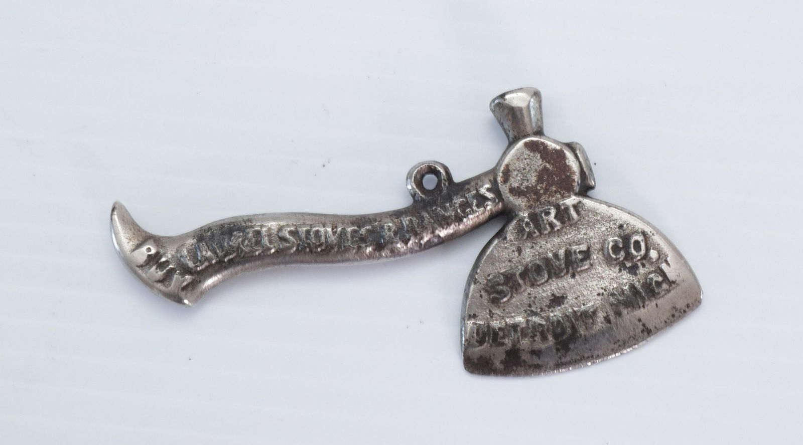 NICKELED CAST IRON ADVERTISING AXE: LAUREL STOVE AND RANGES - DATED 1901 4" L