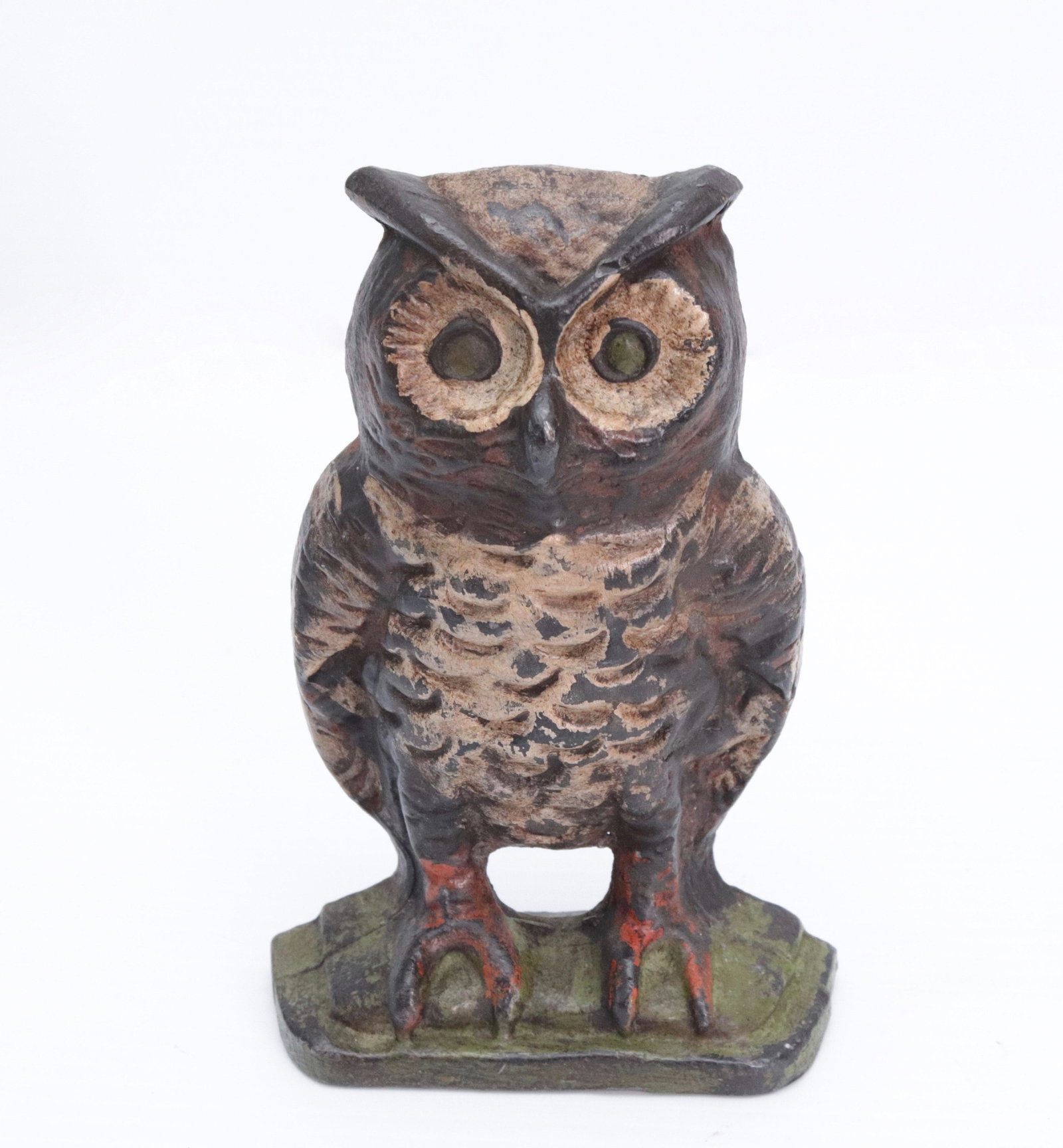 CAST IRON OWL DOORSTOP: PAINTED SURFACE. MARKED ON BACK BOTTOM 6 1/4" H