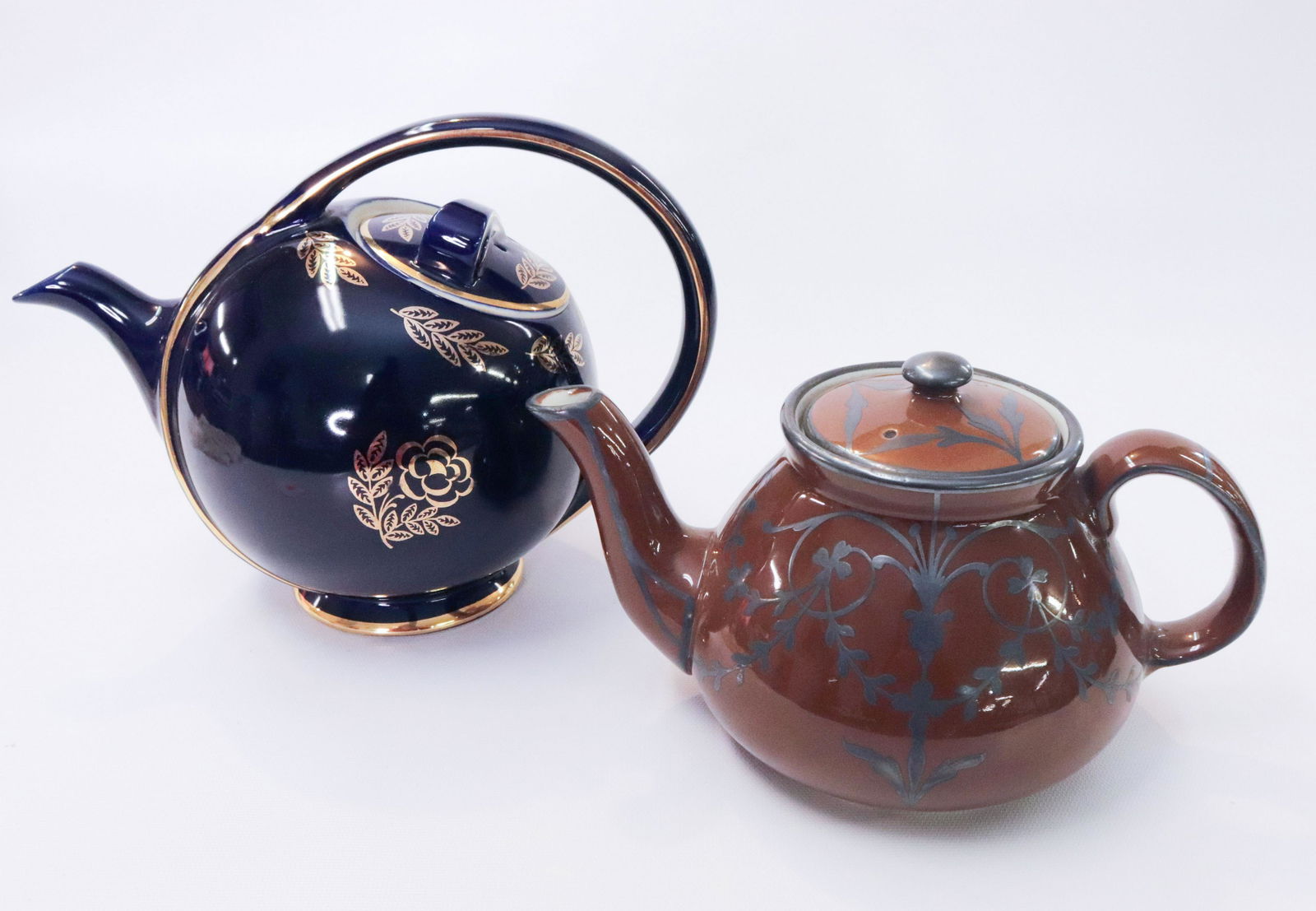 VINTAGE LOT OF HALLS TEAPOTS: COBALT BLUE AND GOLD AIR FLOW 6 CUP TEAPOT AND HALL BROWN & SILVER OVERLAY TEAPOT