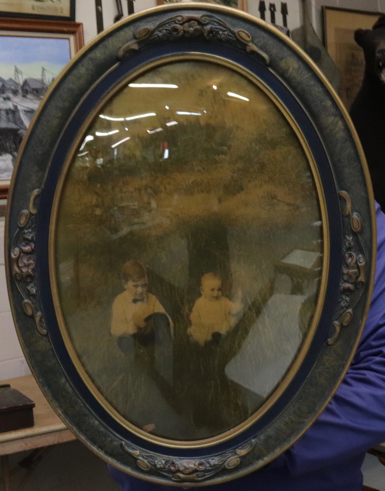 NICE CONVEX GLASS PICTURE FRAME WITH PHOTO: OVAL BLUE AND GOLD WITH FLOWERS, 1920'S 24"X18"