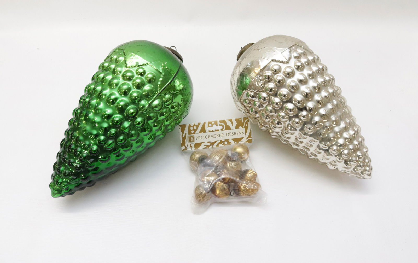 CHRISTMAS ORNIMENTS: TWO LARGE KUGEL STLYE CLUSTER OF GRAPS AND NUTCRACKER DESIGN BALLS GRAPS 12"X 6"