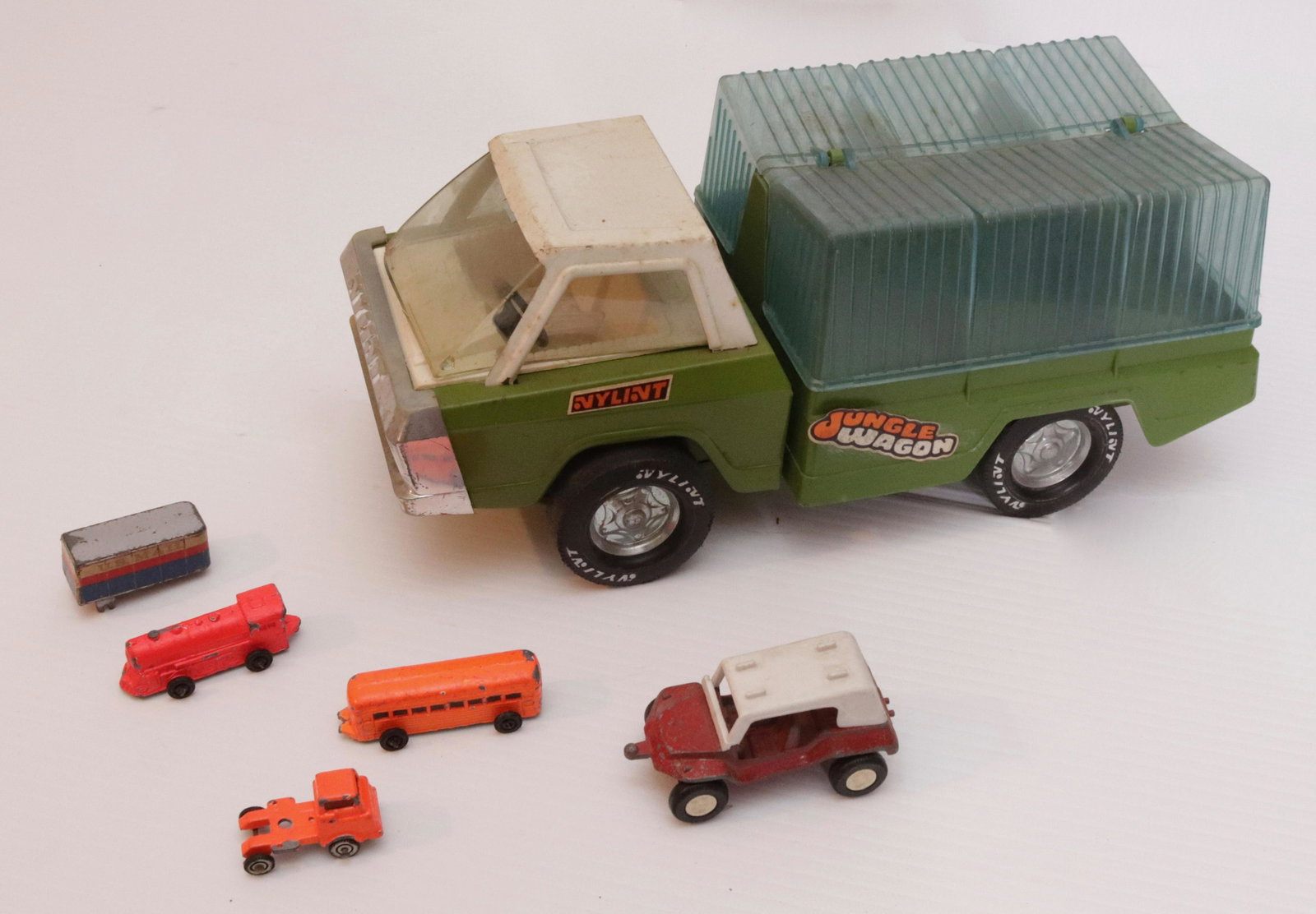 GROUP OF TOYS: NYLINT JUNGLE WAGON AND OTHERS