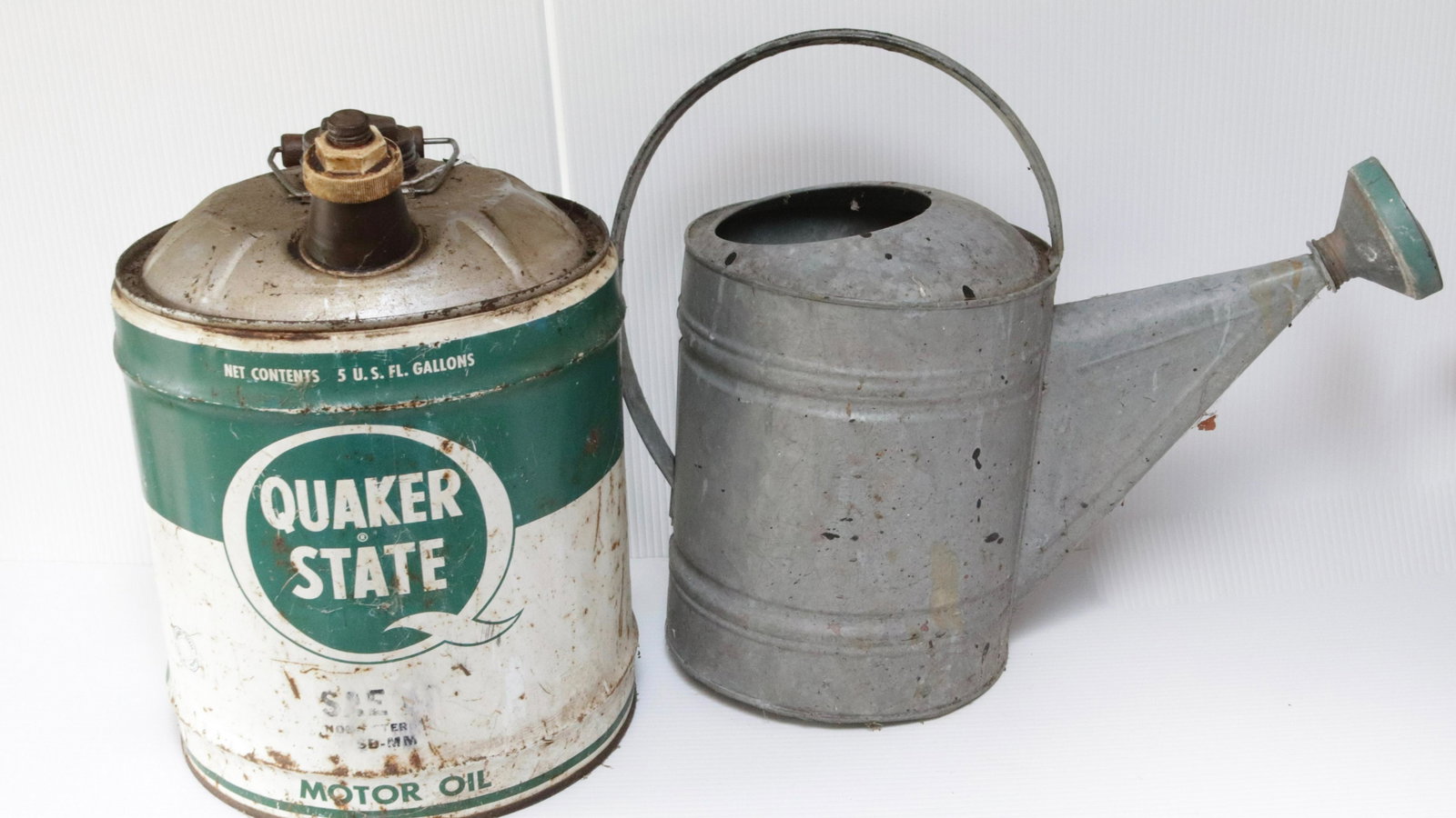 OIL & WATER CANS: QUAKER STATE AND WATERING CAN