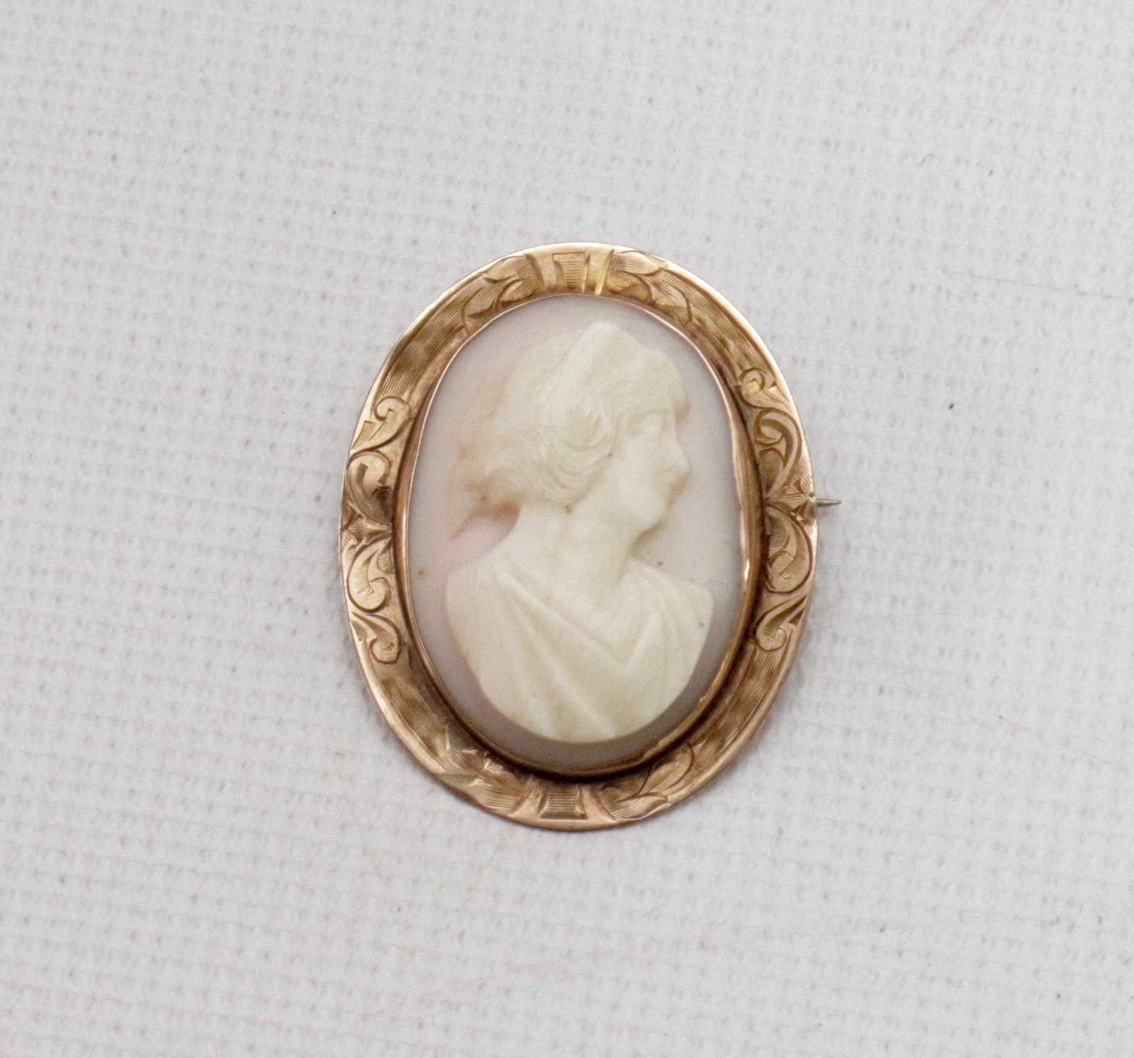 10K GOLD CAMEO: PINK SHELL CARVED CAMEO - ENGRAVED 10K GOLD SETTING 1 1/8" X 1"
