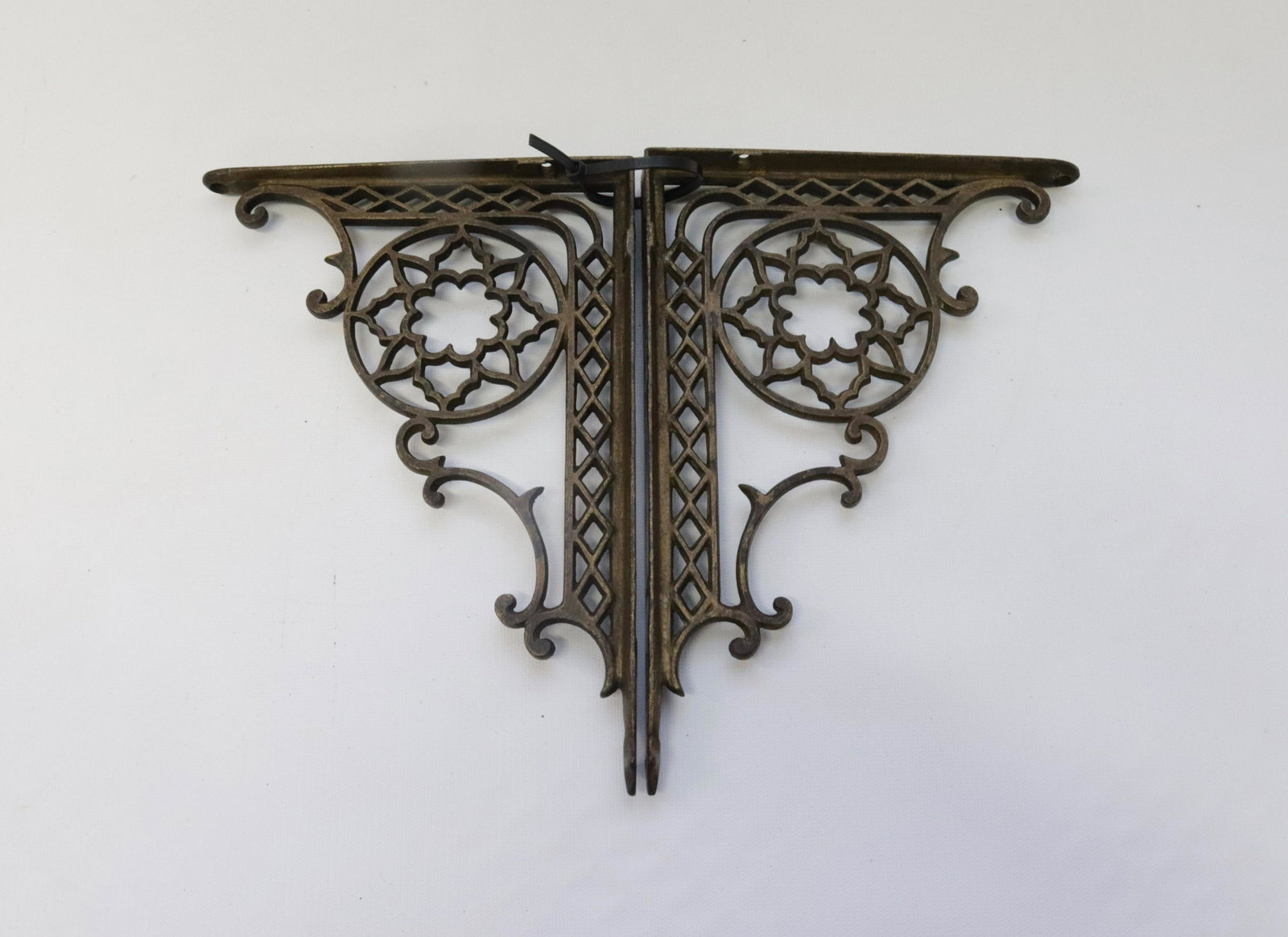 PAIR OF CAST IRON SHELF BRACKETS: PAINTED GOLD SURFACE 9 3/4" X 7"