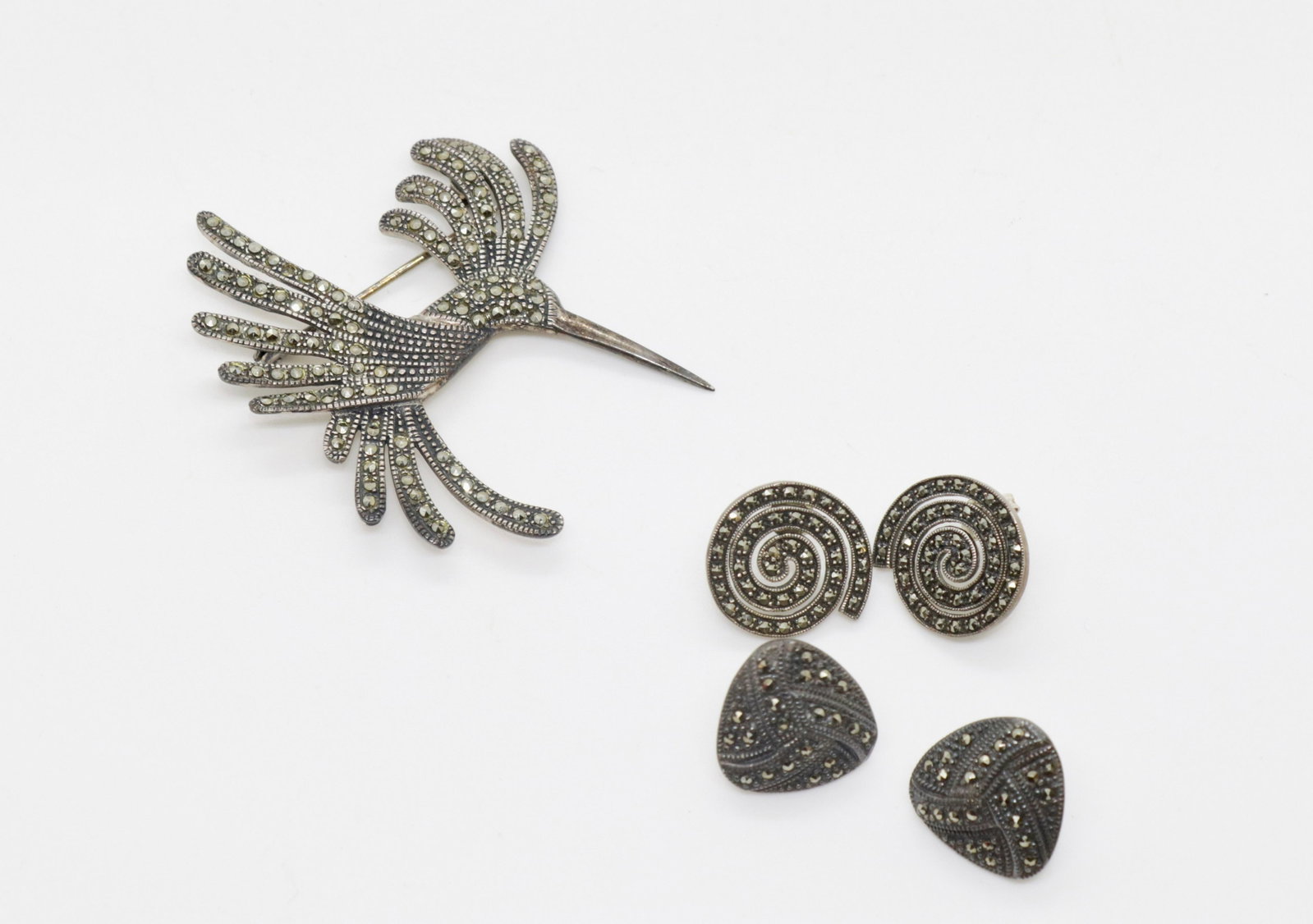 MARCASITE AND STERLING JEWELRY LOT: BIRD BROOCH AND 2 PAIR OF EARRINGS 2" X 2" - 3/4"