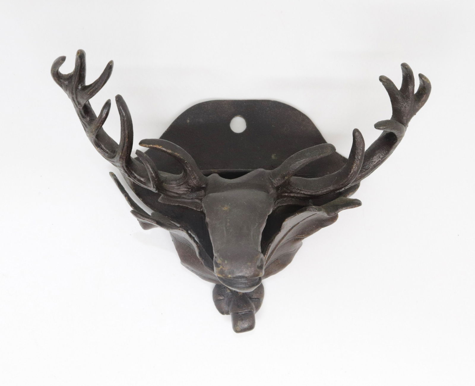 PATINATED BRASS HANGING MATCH HOLDER: FORM OF AN ELK WITH LEAVES BELOW. WHITE METAL BACK AND LEAVES 4.25" X 6" W