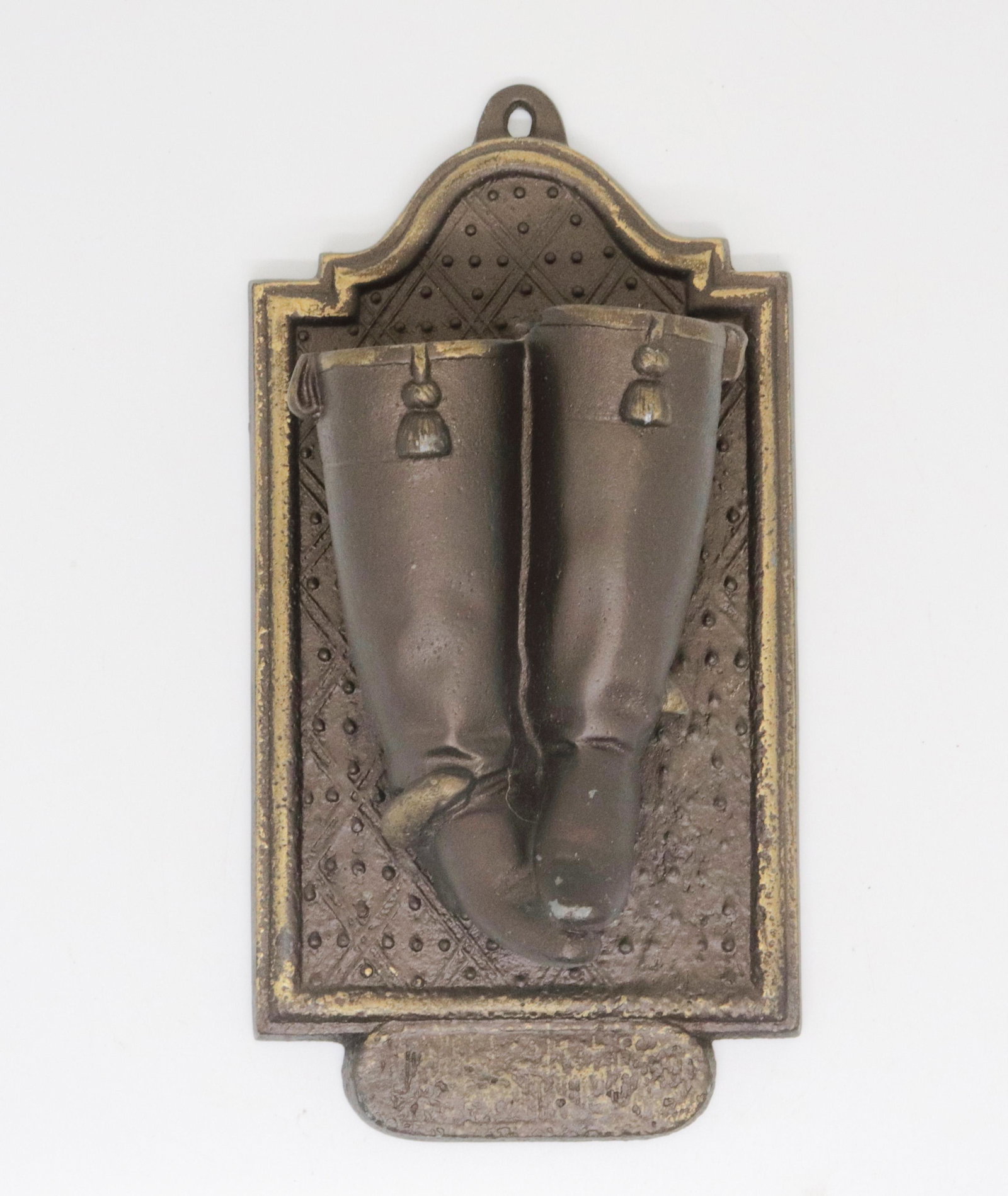 CAST METAL HANGING MATCH HOLDER: PAIR OF BOOTS MOUNTED ON BACKING. PAINT HIGHLIGHTS 7" L