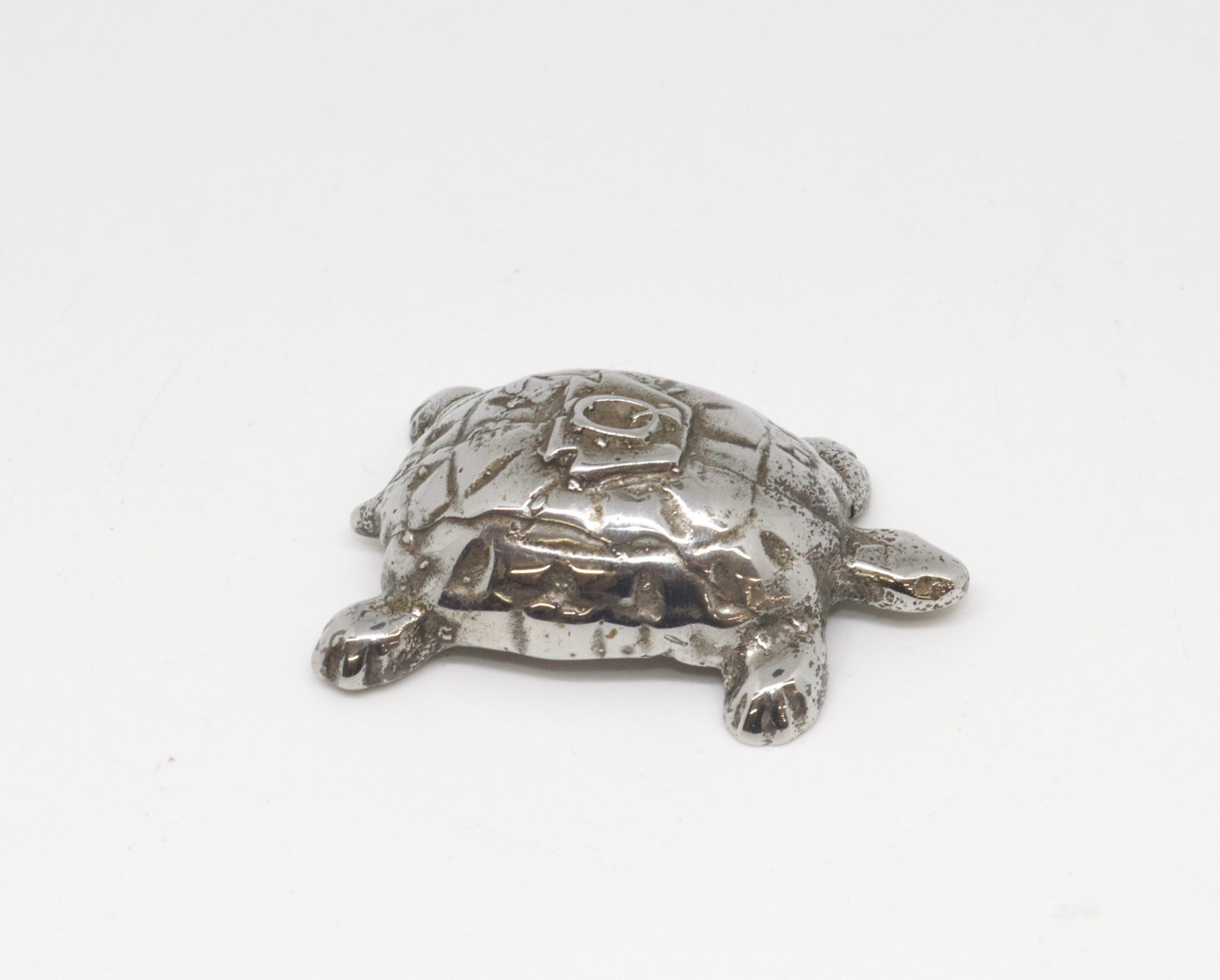 NICKELED CAST IRON PAPERWEIGHT: TURTLE FORM WITH "Q" IN A KEYSTONE 2.5" L