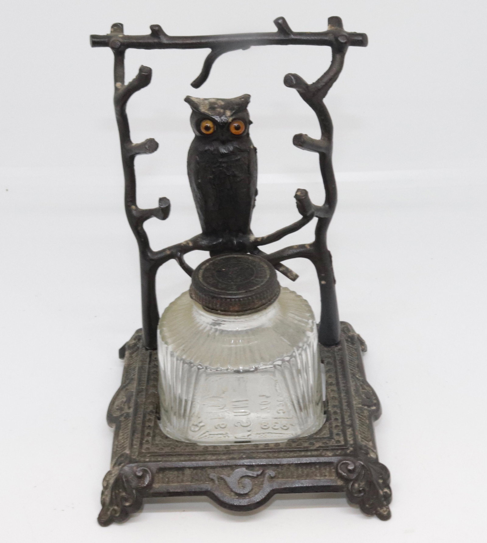 CAST IRON VICTORIAN INKWELL: OWL MOTIF WITH GLASS EYES. GLASS INK BOTTLE WITH LID 6.5" H X 4.75" X 4.75"