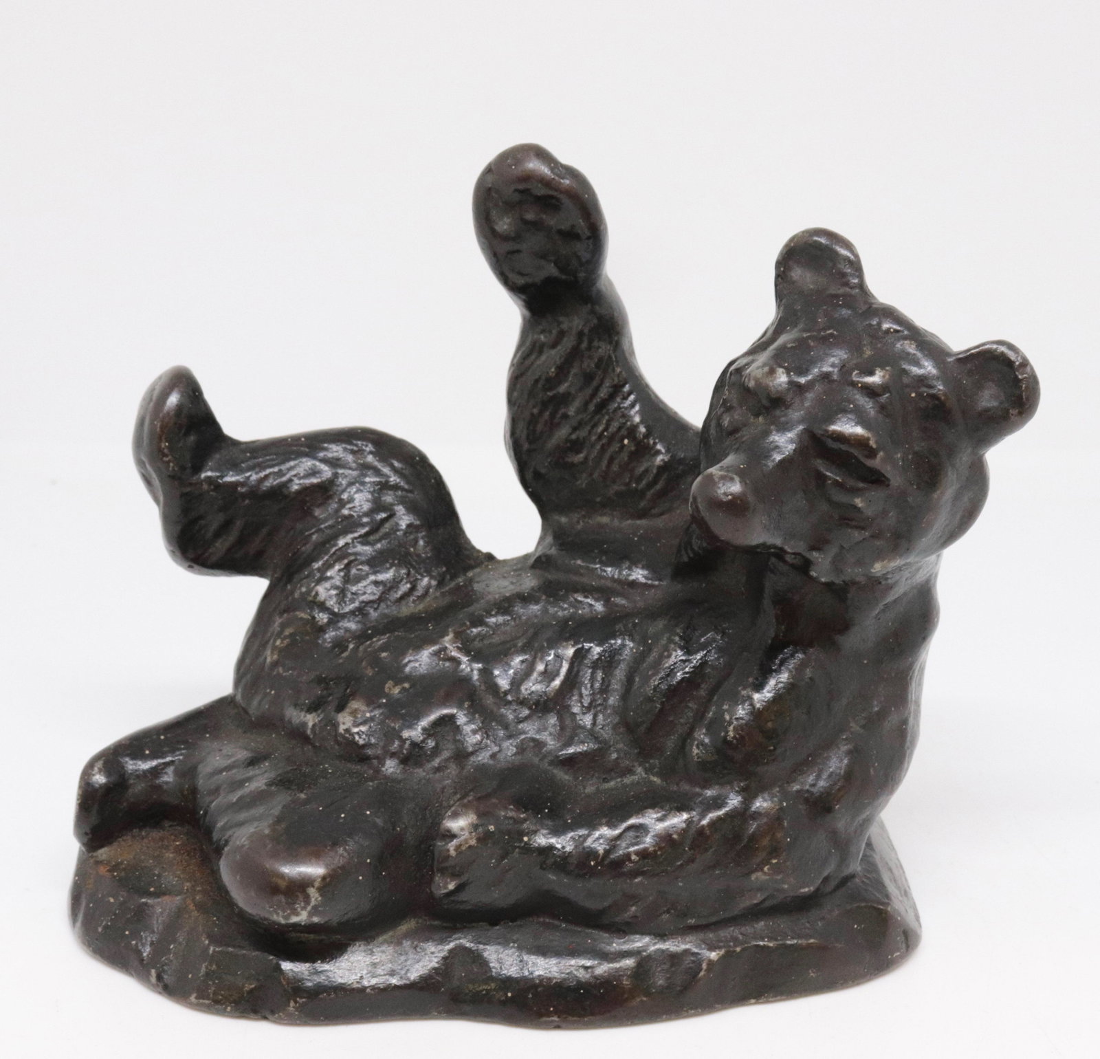 CAST IRON RECLINING BEAR FIGURE: PAINTED BLACK 4.5" H X 5.5" L