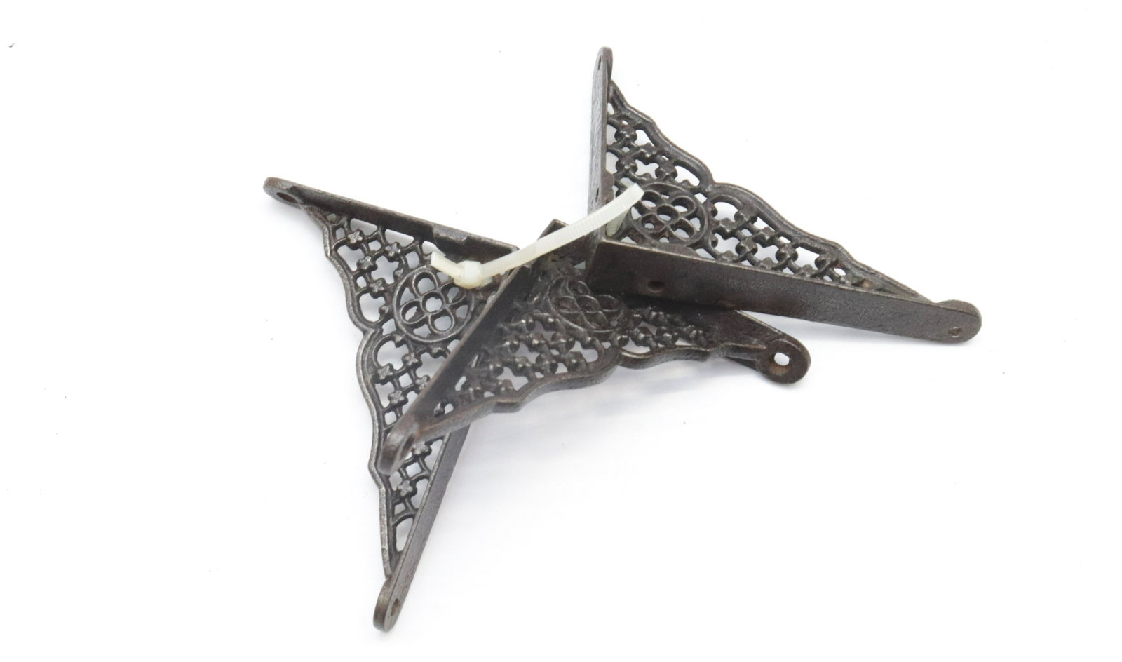 THREE CAST IRON SHELF BRACKETS: PAINTED SURFACE. MATCHING. 4" X 3"