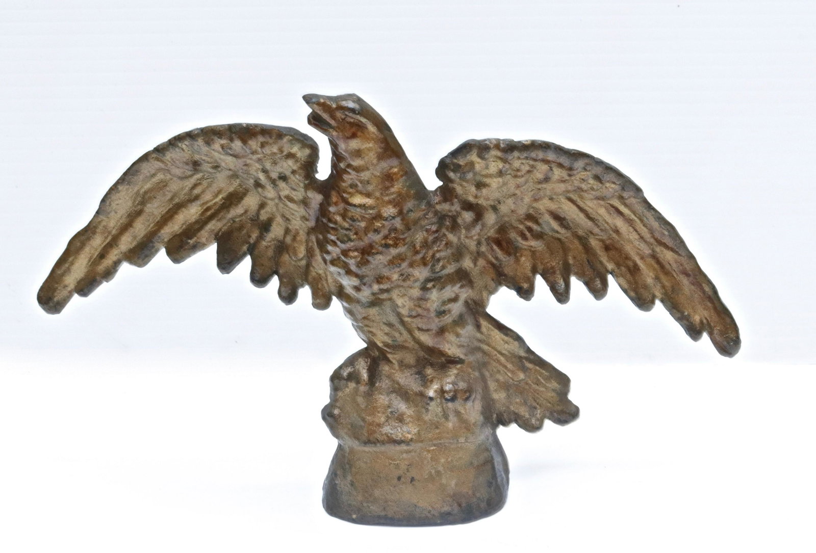CAST IRON EAGLE DOORSTOP: SPREAD WINGS. PAINTED GOLD 6.5" H X 11" L