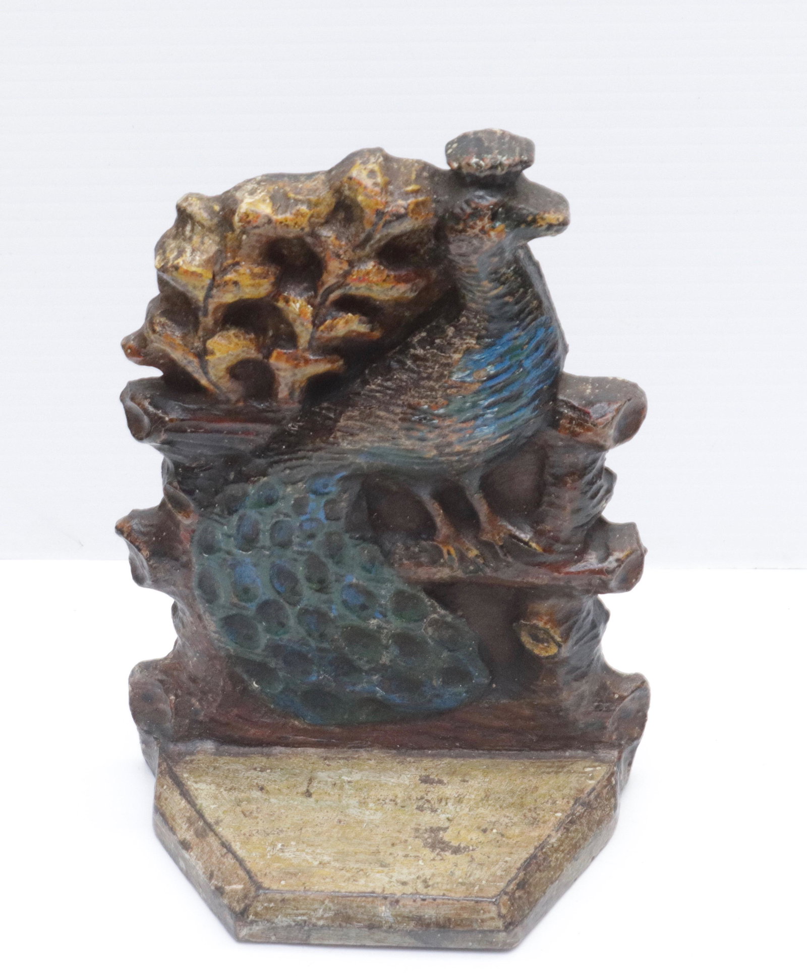 CAST IRON PEACOCK DOORSTOP: PEACOCK ON A FENCE. 8" H X 6" W