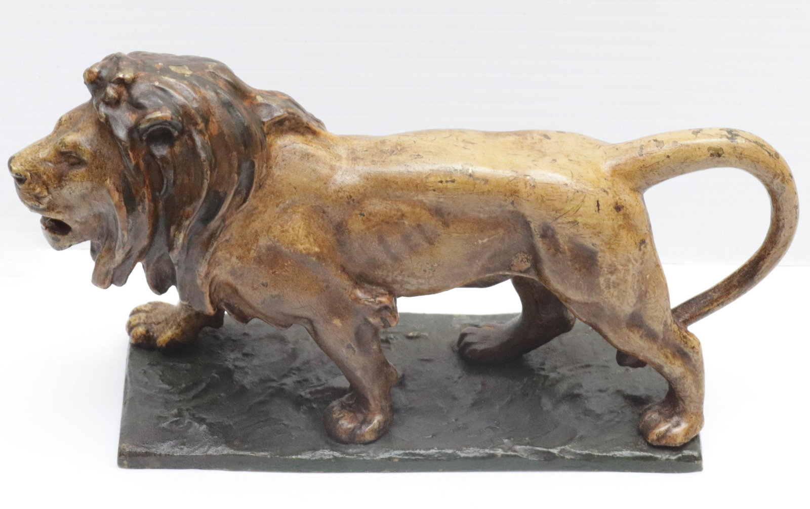 CAST BRASS LION DOORSTOP: PAINTED SURFACE 10" L