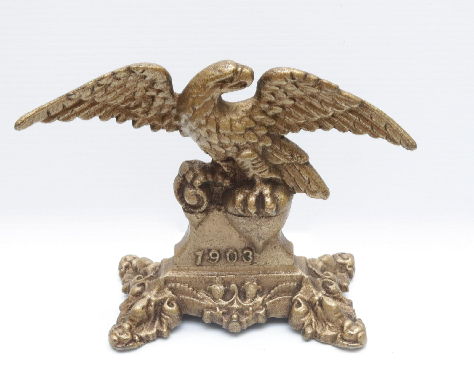 CAST IRON EAGLE DOORSTOP: GOLD PAINTED SURFACE. DATED 1903 8" H X 10.5" W