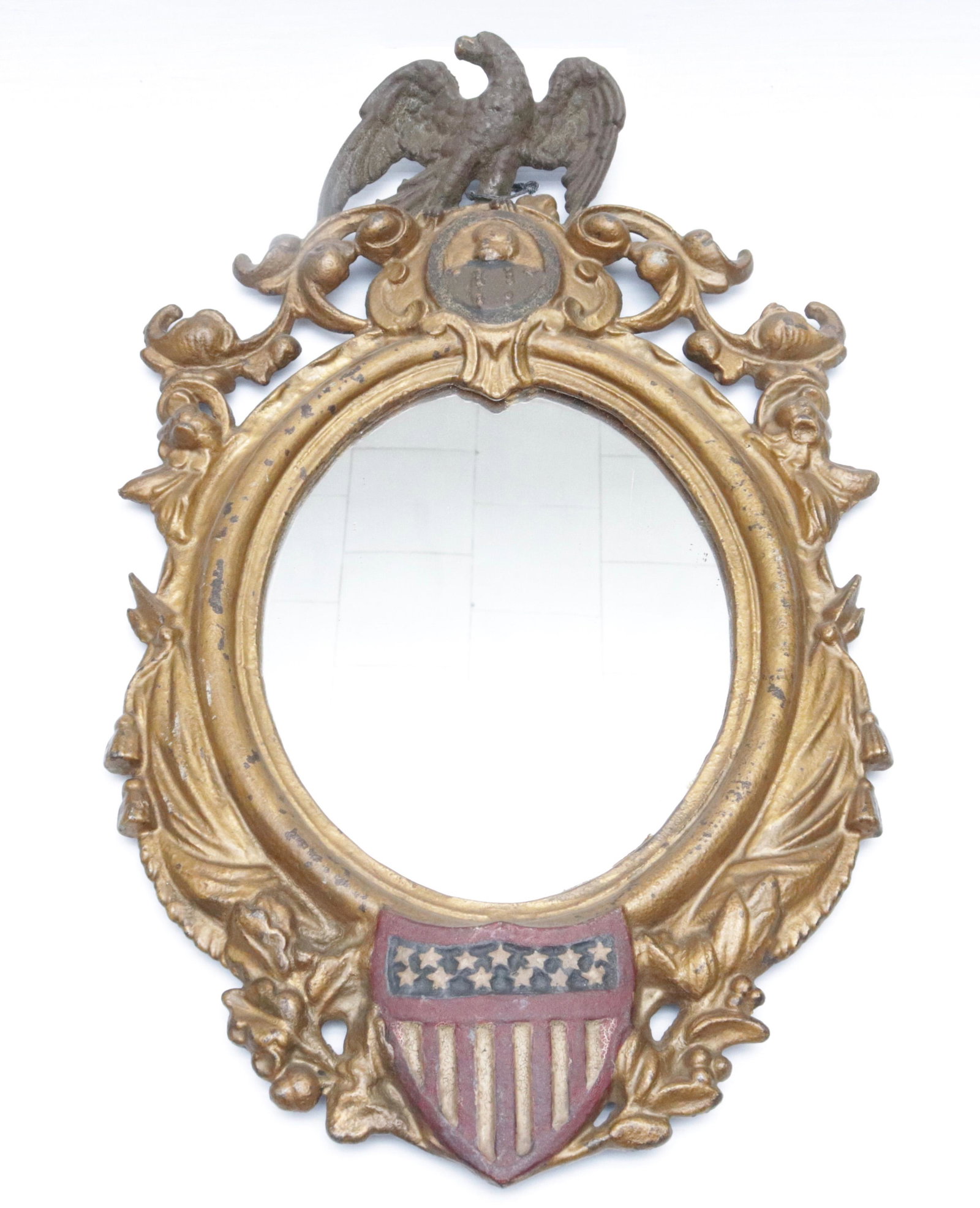 ANTIQUE CAST IRON ADMIRAL DEWEY MIRROR: EAGLE AND SHIELD MOTIF. PAINTED SURFACE 19.5" H