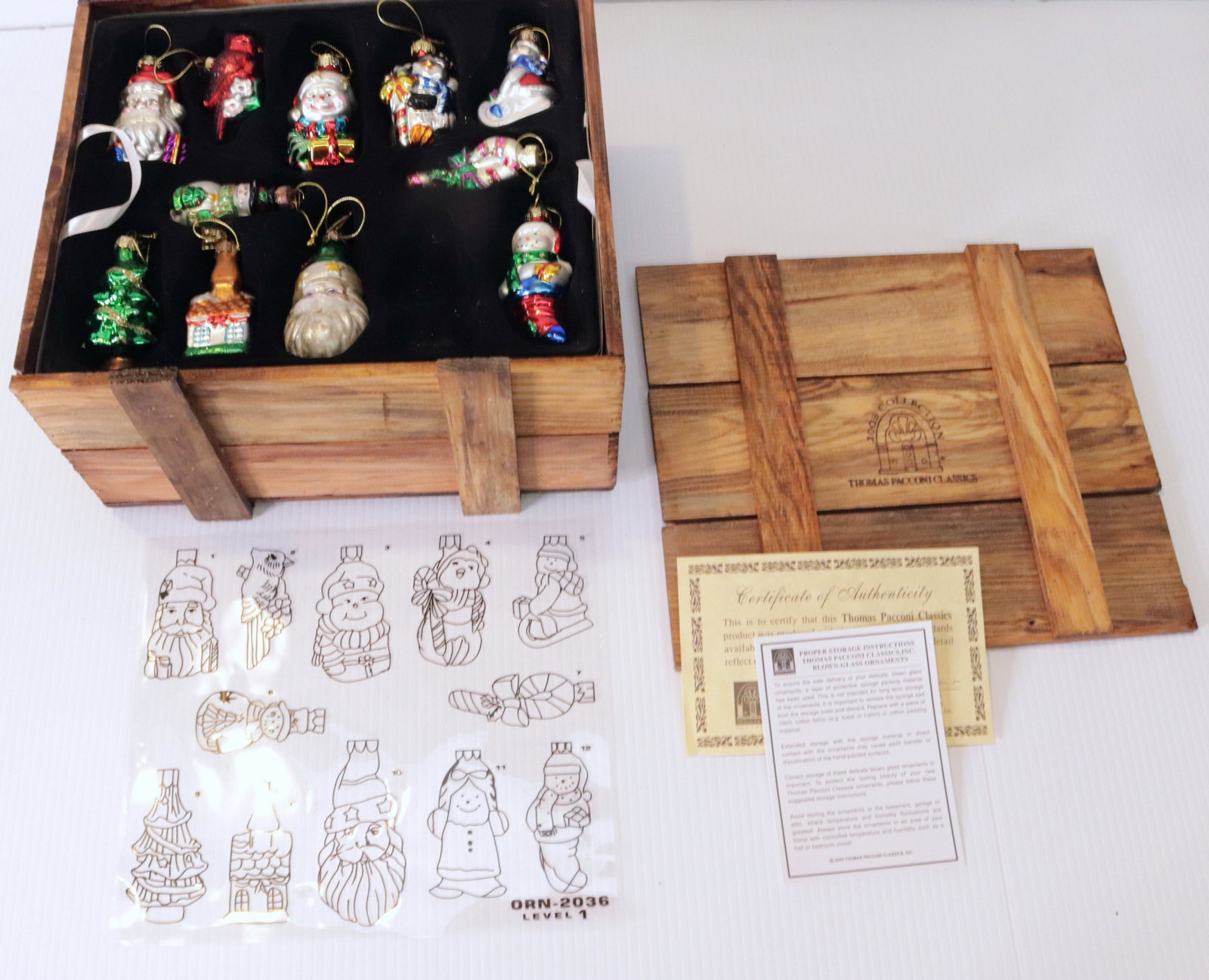 CRATE OF THOMAS PACCONI CHRISTMAS ORNAMENTS: (23) 2003 COLLECTION IN ORIGINAL CRATE