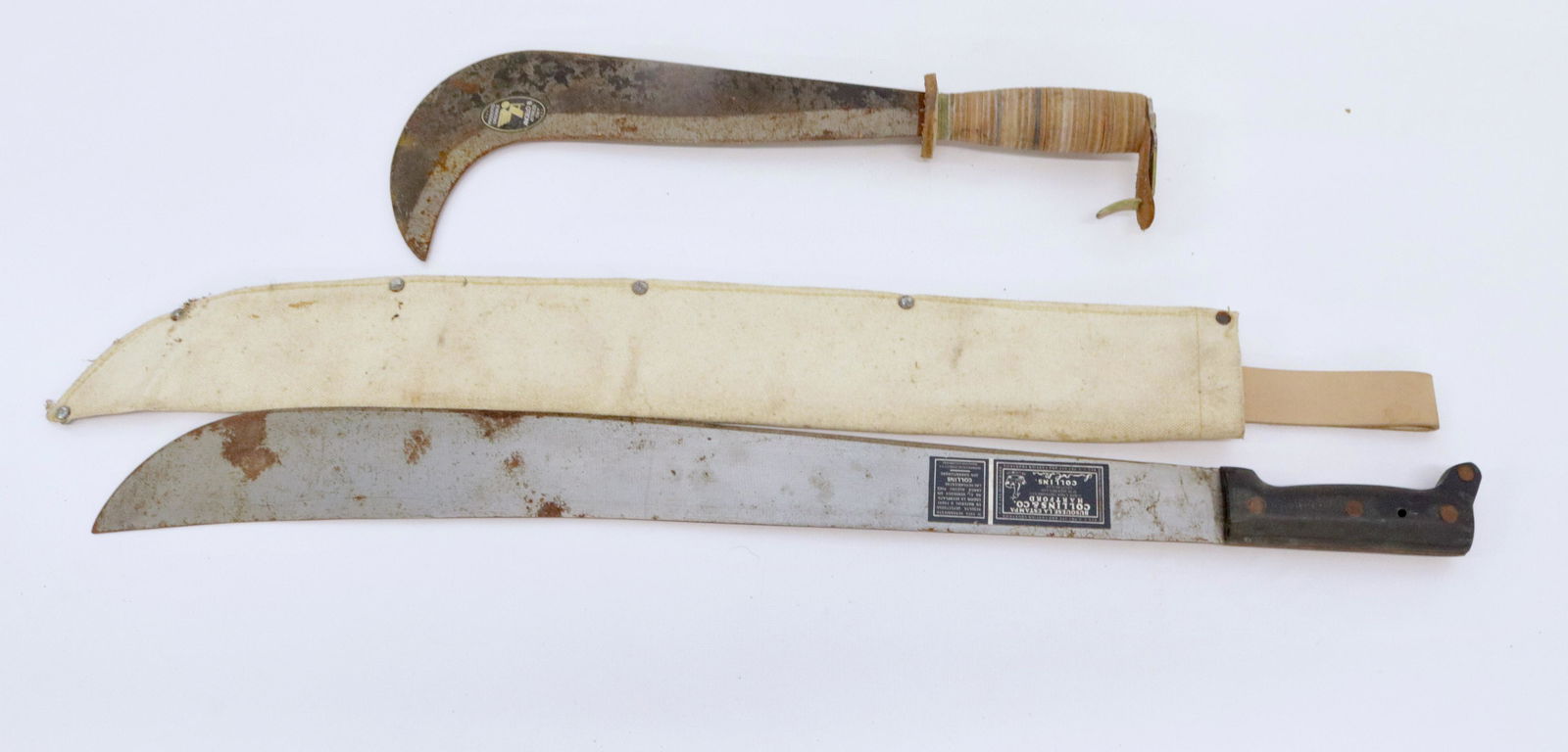 PAIR OF VINTAGE MACHETES: ANGELO B" WITH LEATHER WRAPPED HANDLE AND COLLINS&CO. WITH CANVAS SHEATH BLADES 12" TO 22
