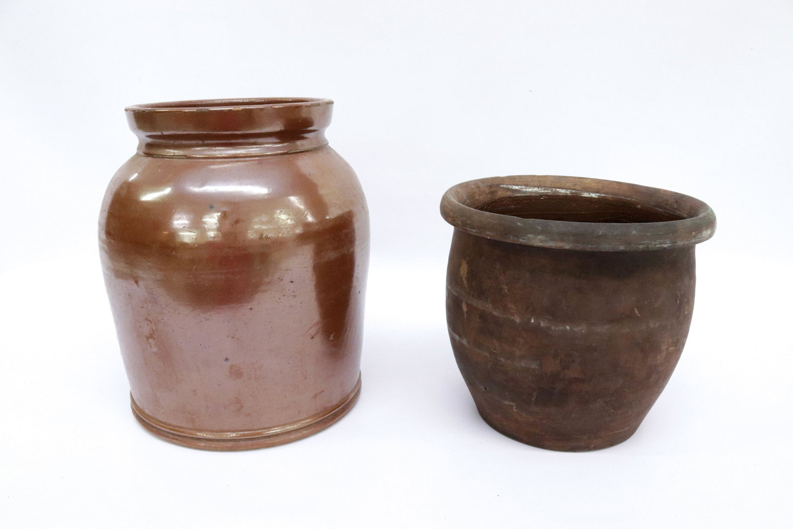 PAIR OF ANTIQUE CROCKS: SMALLER IS REDWARE TALLEST IS 9.5"