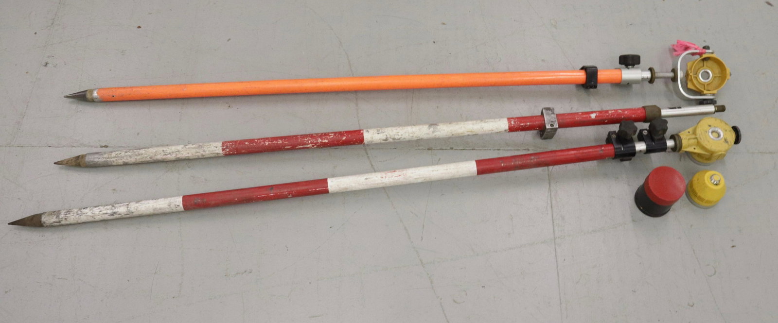 GROUP LOT OF SURVEYOR EQUIPMENT: TOPCON PRISM REFLECTORS AND POLES