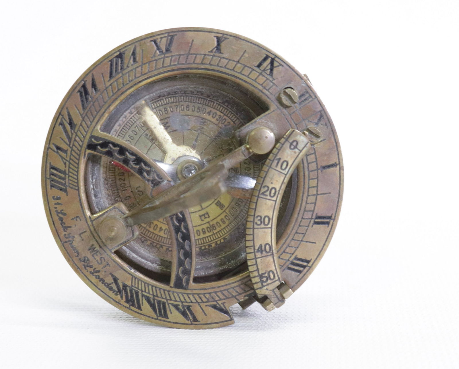 BRASS COMPASS AND SUNDIAL, LONDON: MRKD. F.L. WEST, LONDON 2.75" D