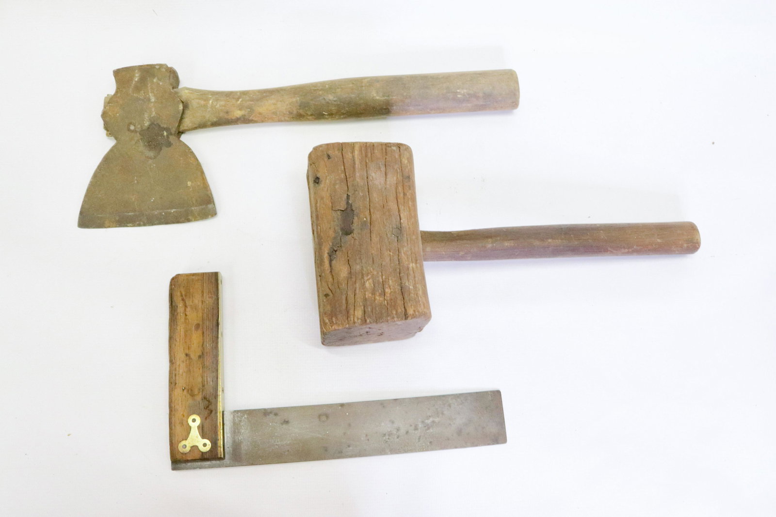 GROUP LOT OF ANTIQUE TOOLS: (3) INCLUDING: CARPENTER'S MALLET, TRY SQUARE AND BROAD AXE AXE BLADE MEASURES 5" X 6"